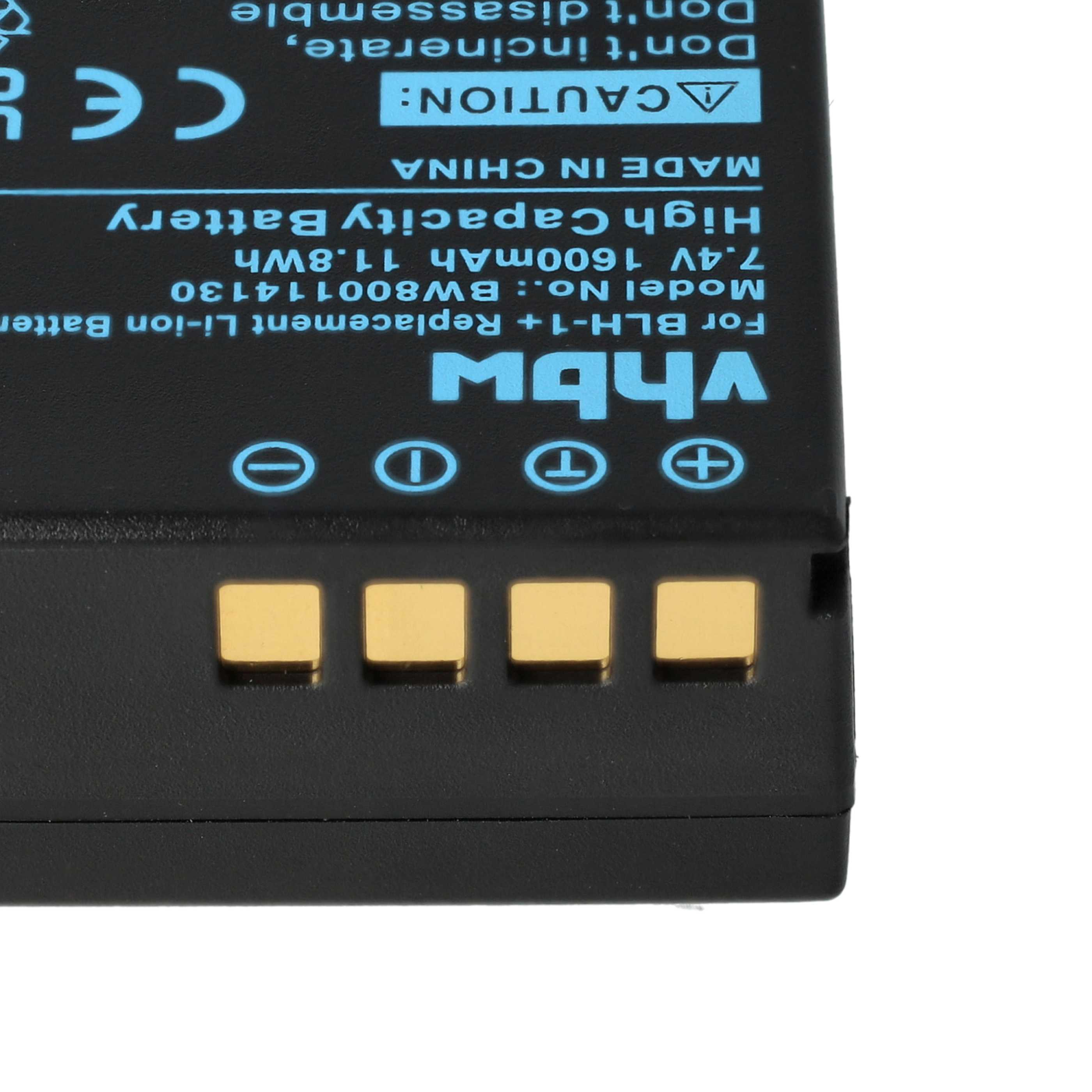 Schwarze Batterie mit Goldkontakten und Warnhinweis, Nahaufnahme.