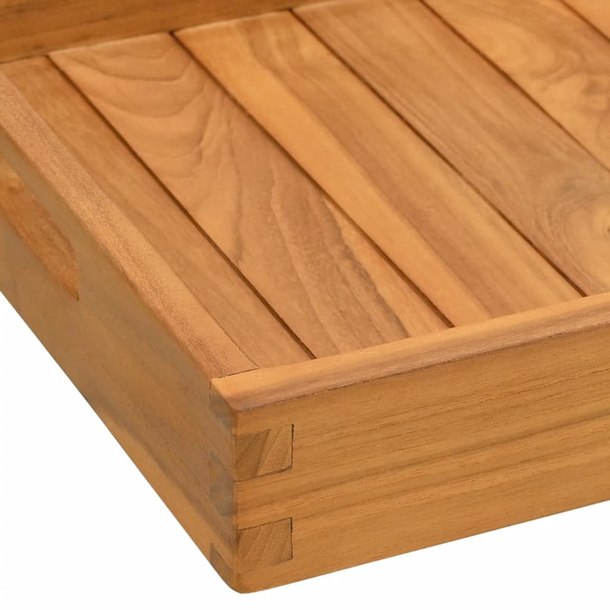 Nahaufnahme eines Holztabletts mit Schwalbenschwanzverbindungen an den Ecken. Hellbraunes Holz.