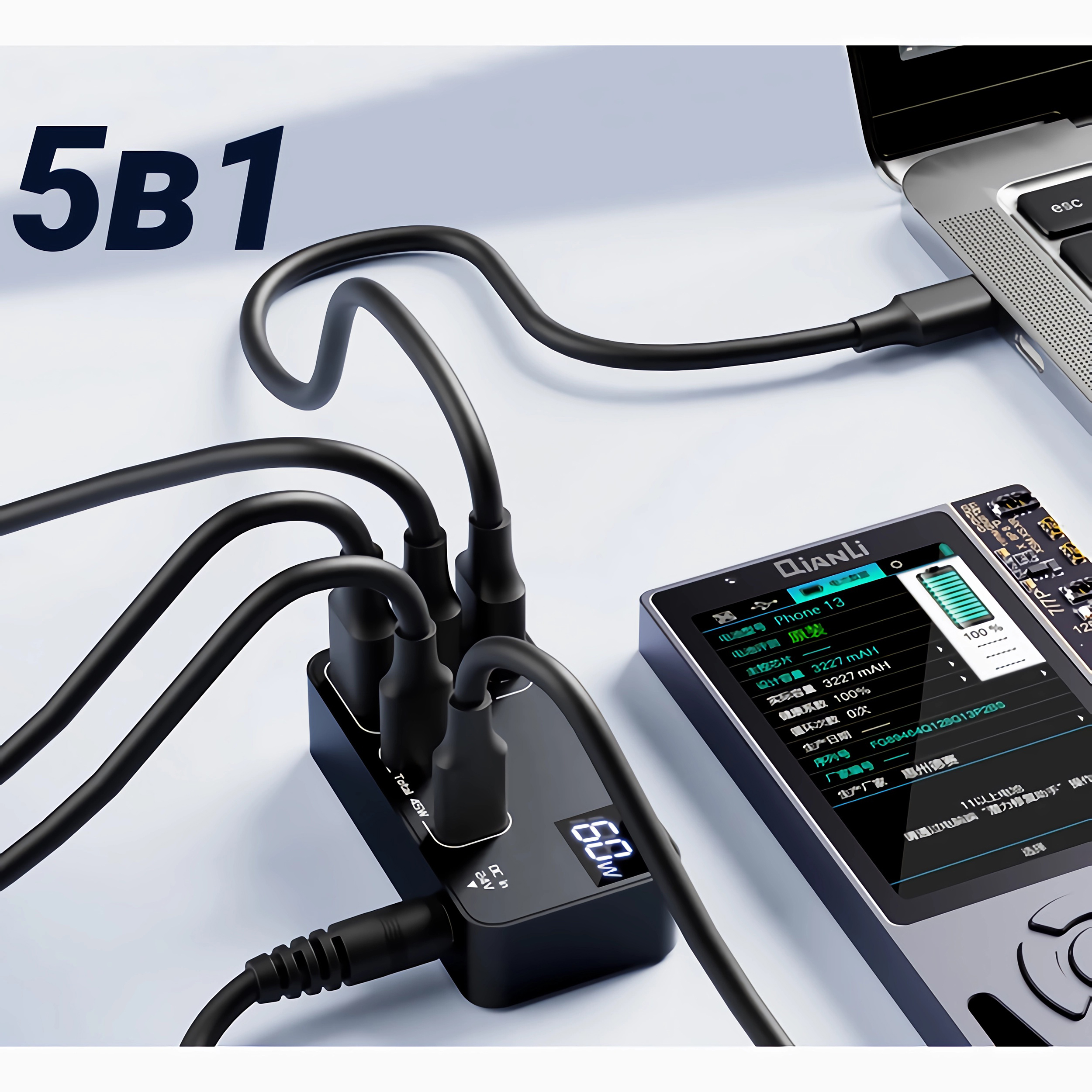 Ein schwarzer USB-Hub, der mit einem Laptop verbunden ist, und ein Tablet mit Informationen.