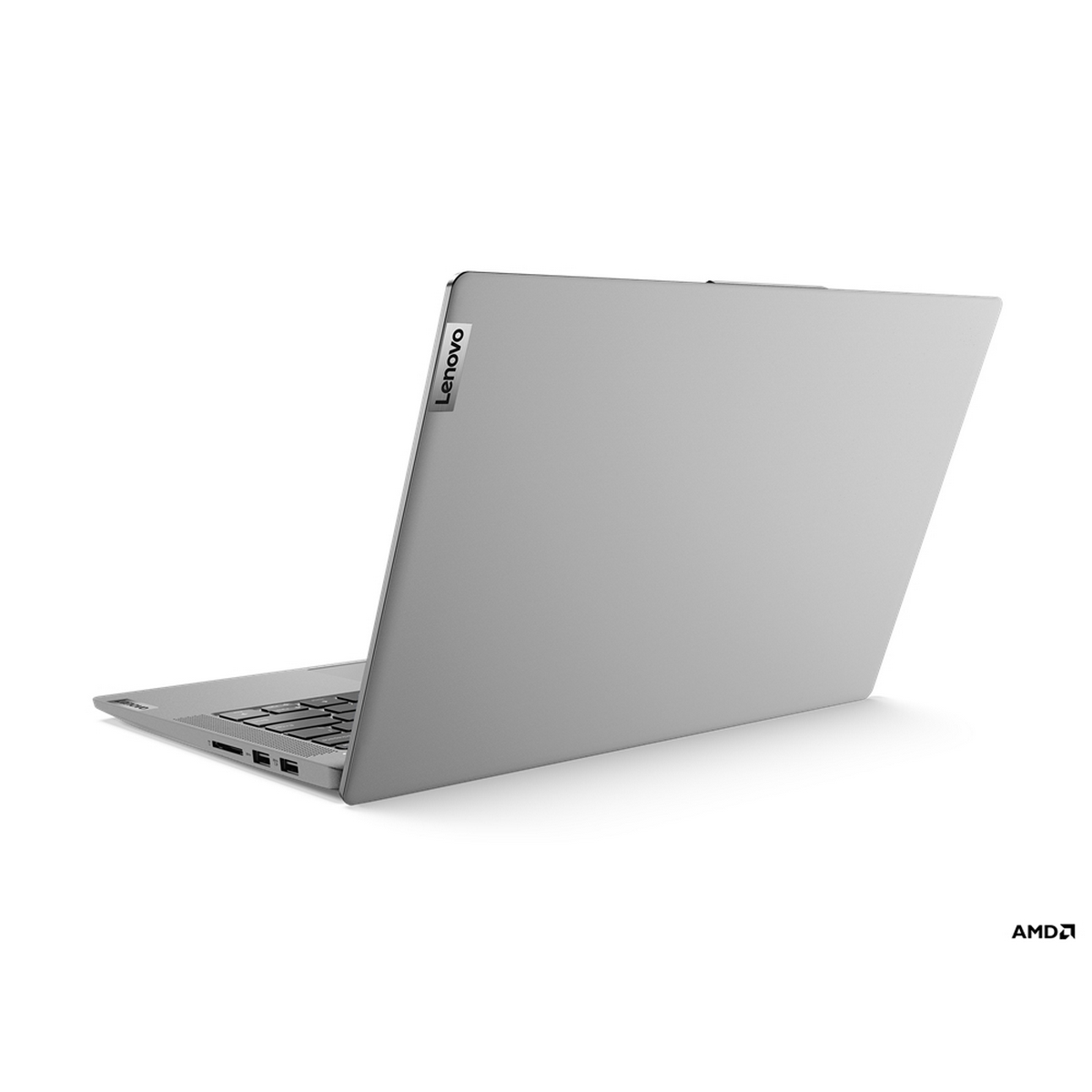 Un laptop Lenovo grigio su una superficie bianca, vista posteriore.