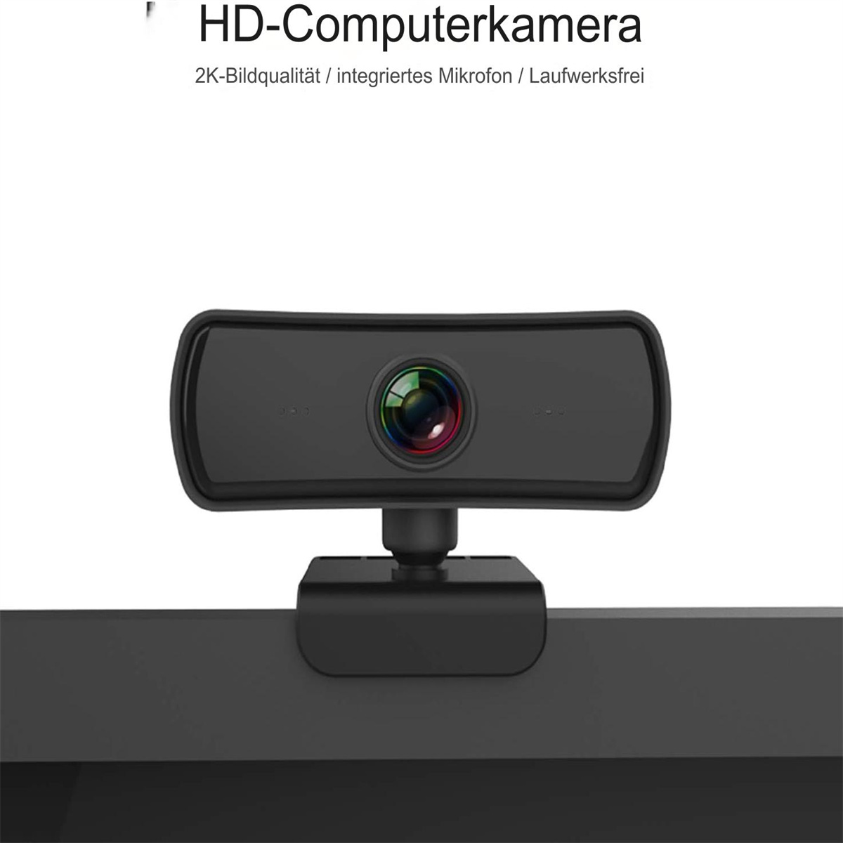 Eine schwarze Webcam auf einem Schreibtisch. Die Kamera hat ein Objektiv und eine Halterung.