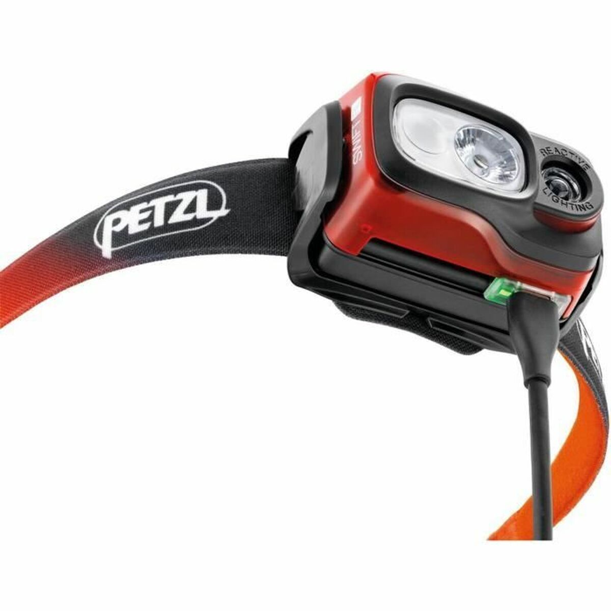 Czerwono-czarna czołówka z logo PETZL, światłem i kablem do ładowania.