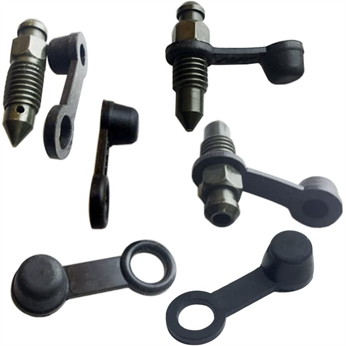 Sechs kleine Metallteile mit Gummiabdeckungen. Sie haben unterschiedliche Formen. Einige sind metallisch, andere haben Gummiabdeckungen.