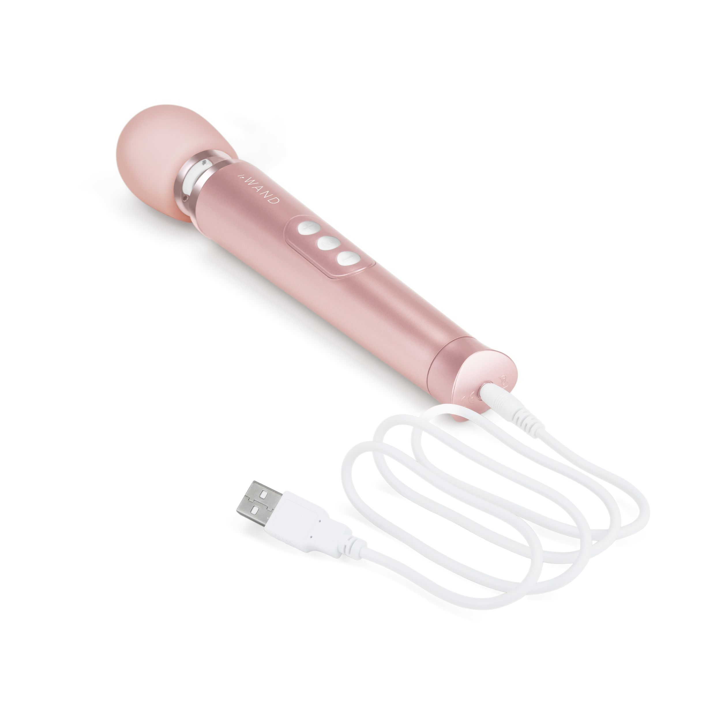Ein roségoldenes Sexspielzeug mit angeschlossenem USB-Ladekabel.