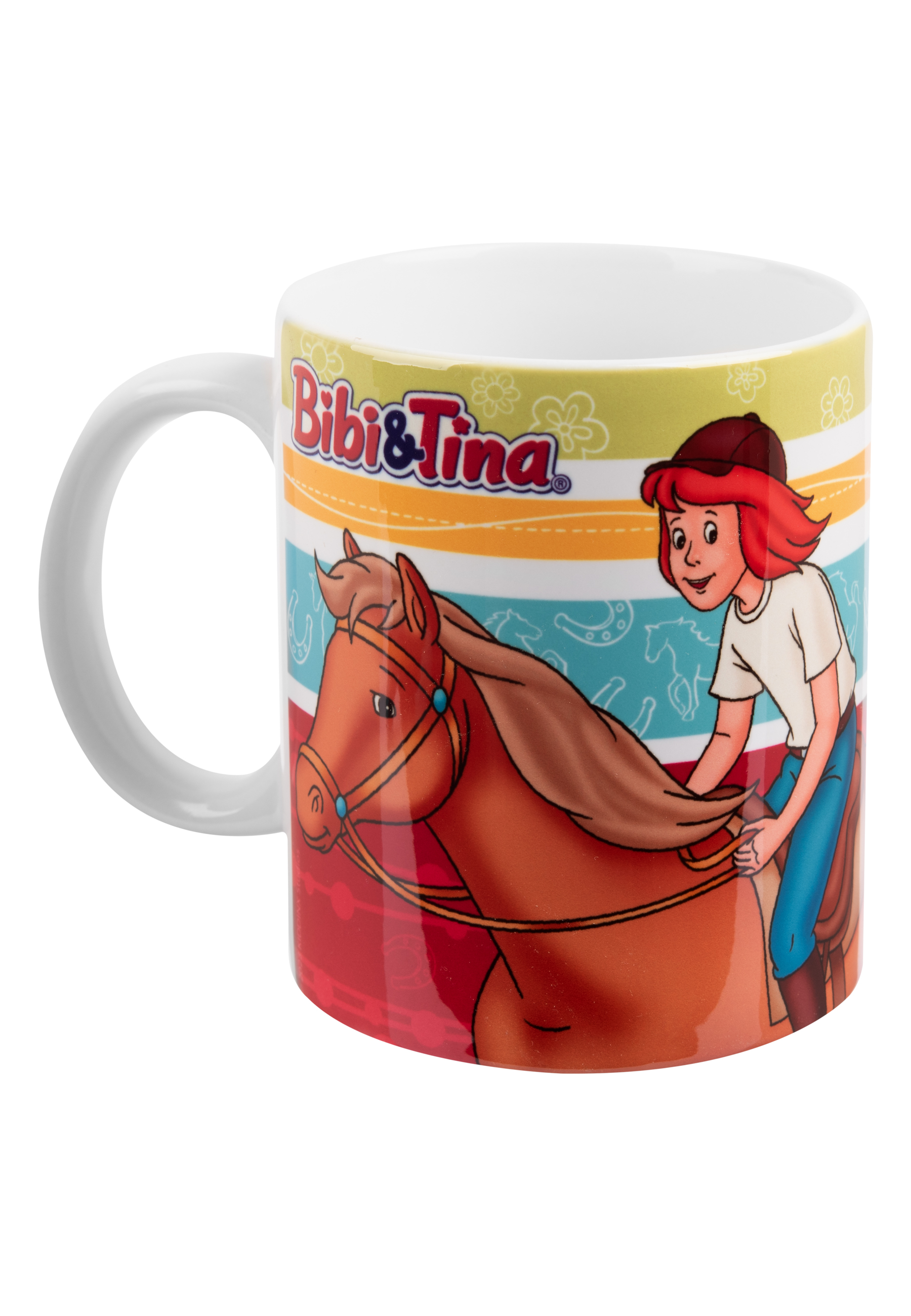 Tasse mit einem Cartoon eines Mädchens, das ein Pferd reitet. Buntes Design mit den Worten 'Bibi & Tina'.