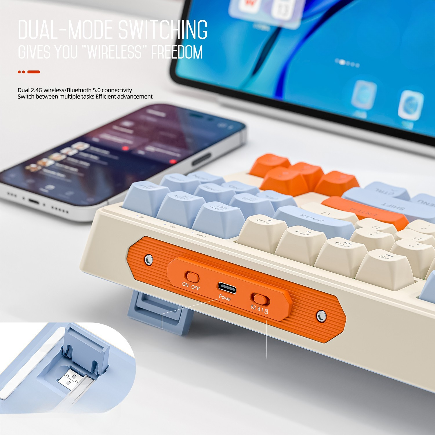Eine Tastatur mit mehrfarbigen Tasten. Ein Telefon und ein Tablet liegen daneben. Zeigt kabellose Freiheit.