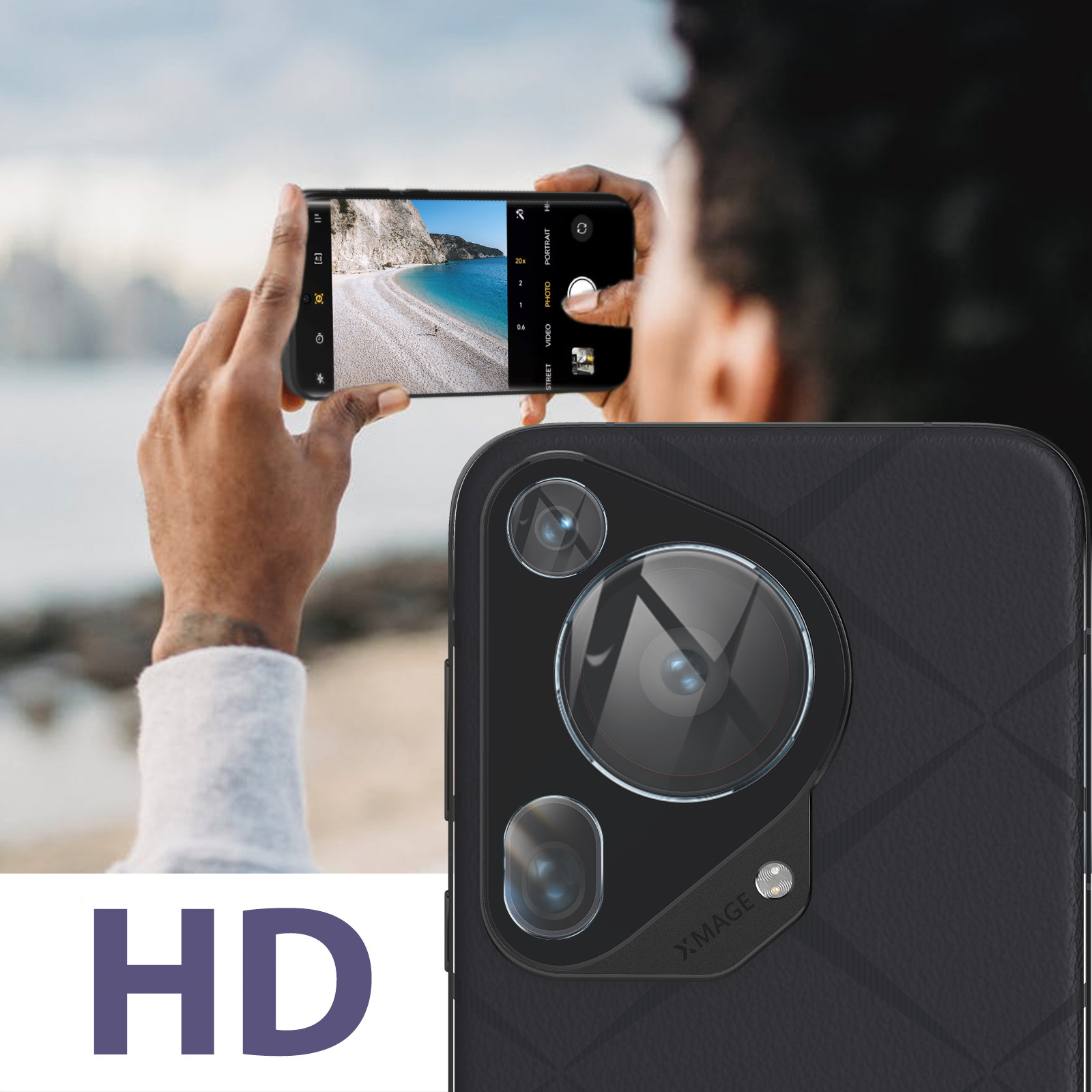 Una persona che tiene un telefono nero scatta una foto. Le lenti della fotocamera del telefono sono visibili, con la parola HD.