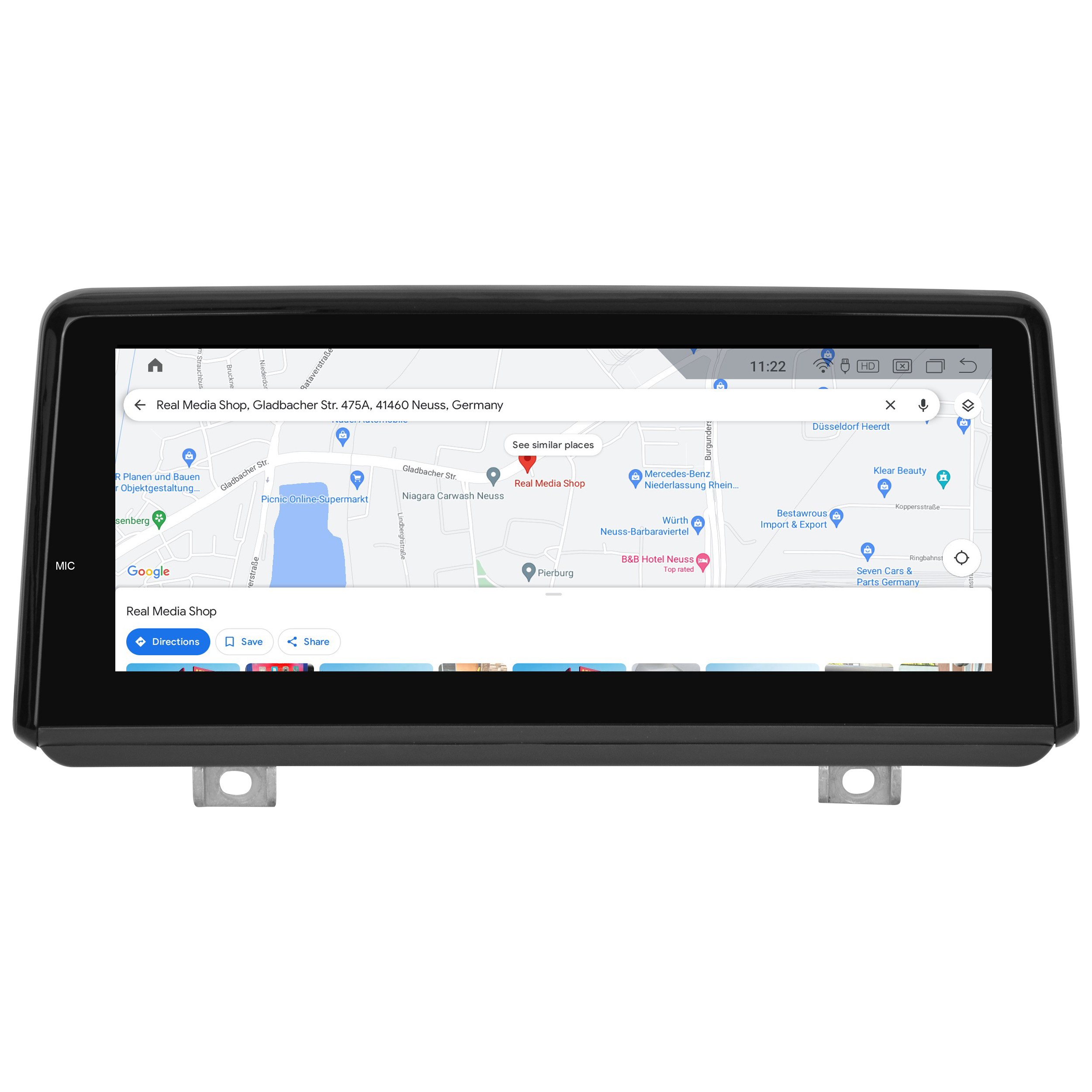 GPS-Bildschirm, der eine Karte anzeigt. Es zeigt eine Straße mit Gebäuden und einen Standort-Pin.