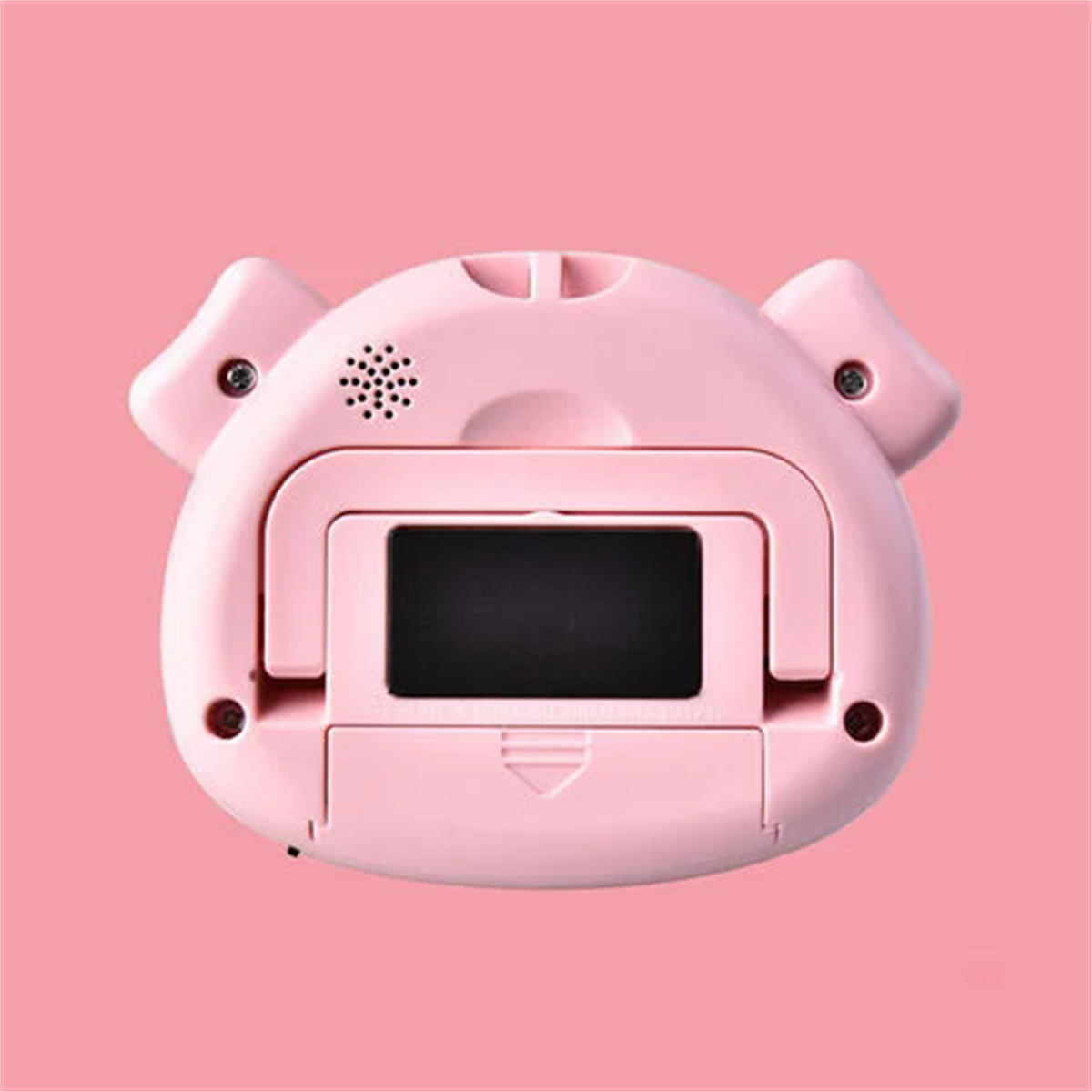 Rosa digitaler Wecker in Schweineform mit Bildschirm. Design mit Ohren und Lautsprecher.