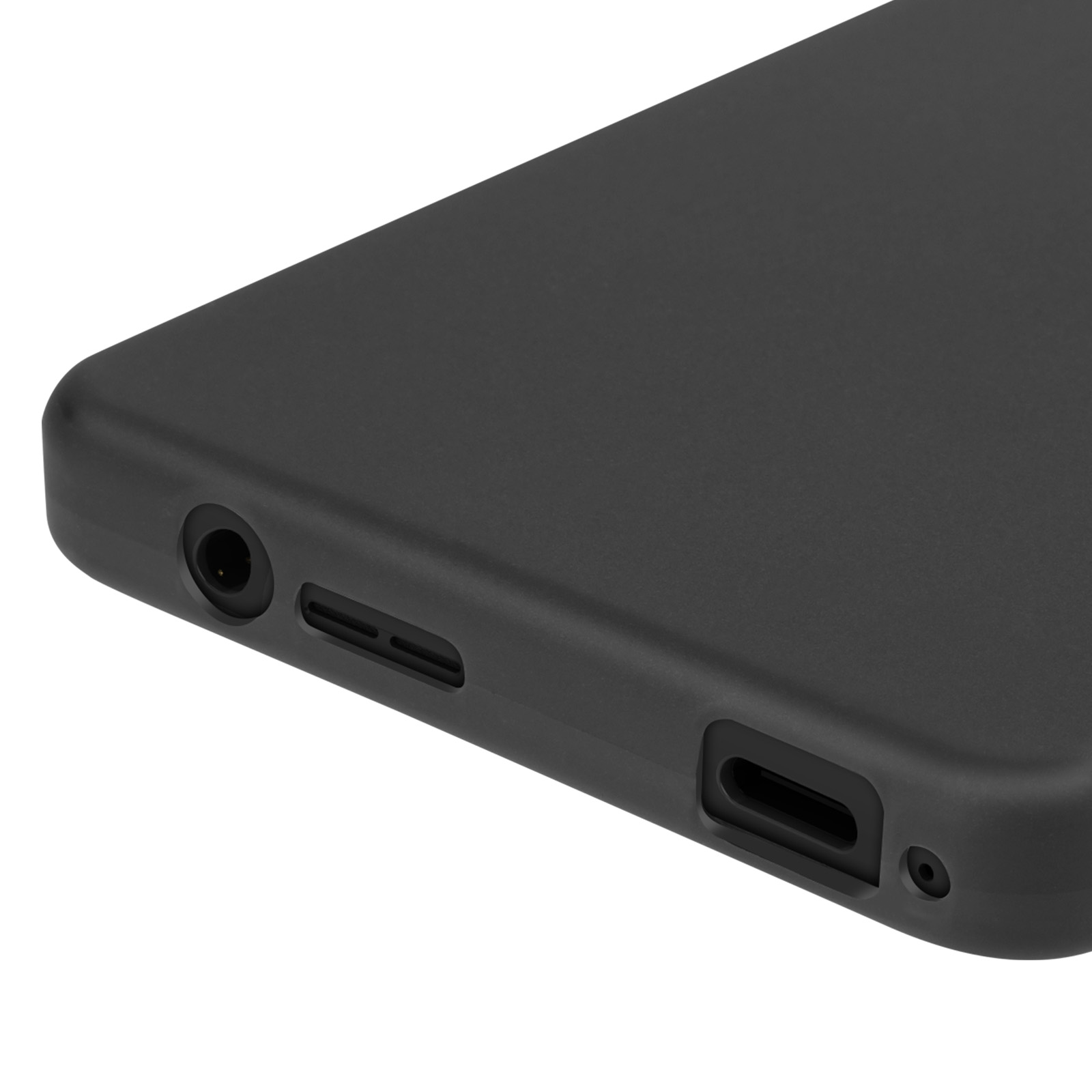 Primer plano de la parte inferior de un teléfono negro. Tiene conector para auriculares, altavoz y puerto de carga.