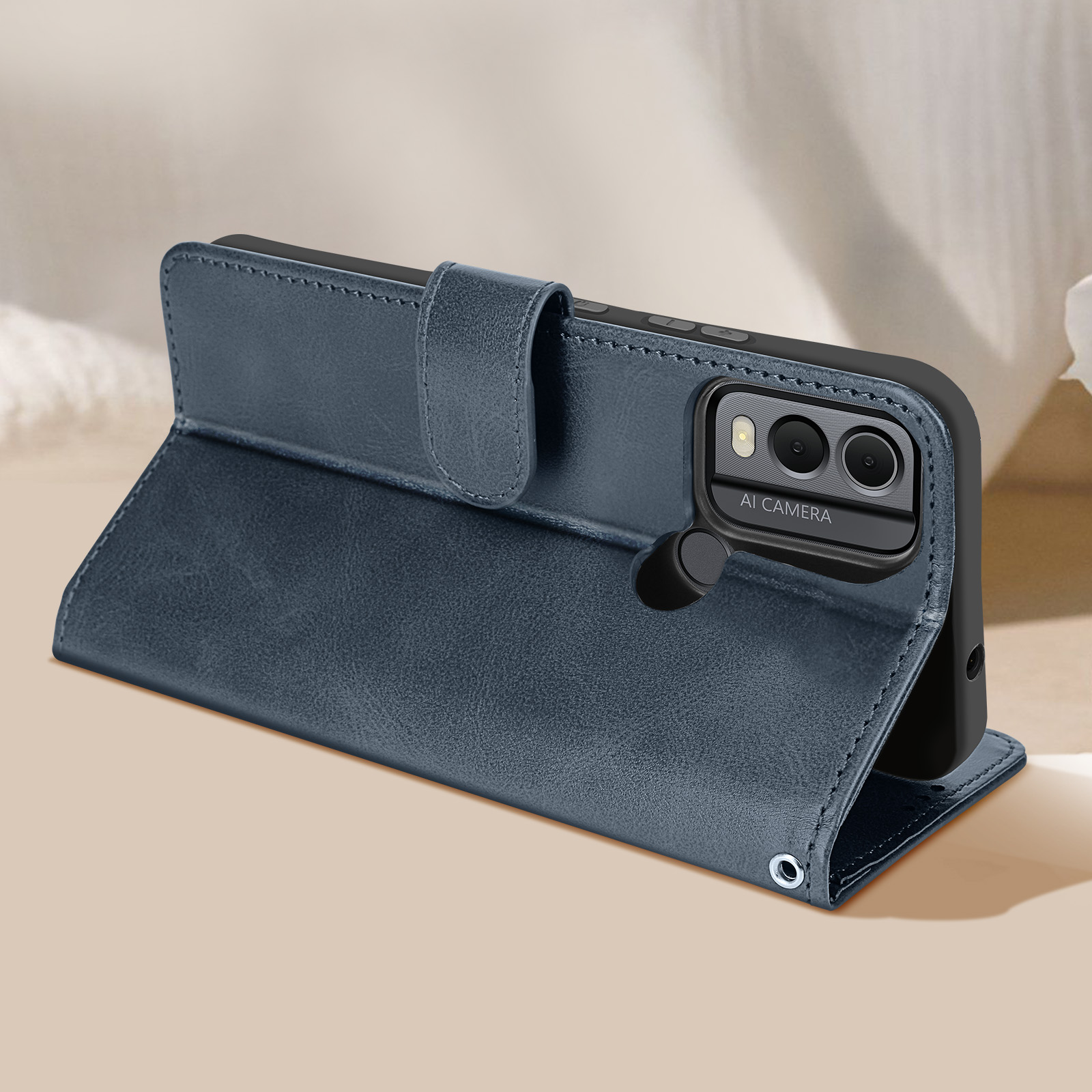 Custodia blu per telefono aperta. Il telefono è all'interno. La custodia è appoggiata su una superficie.