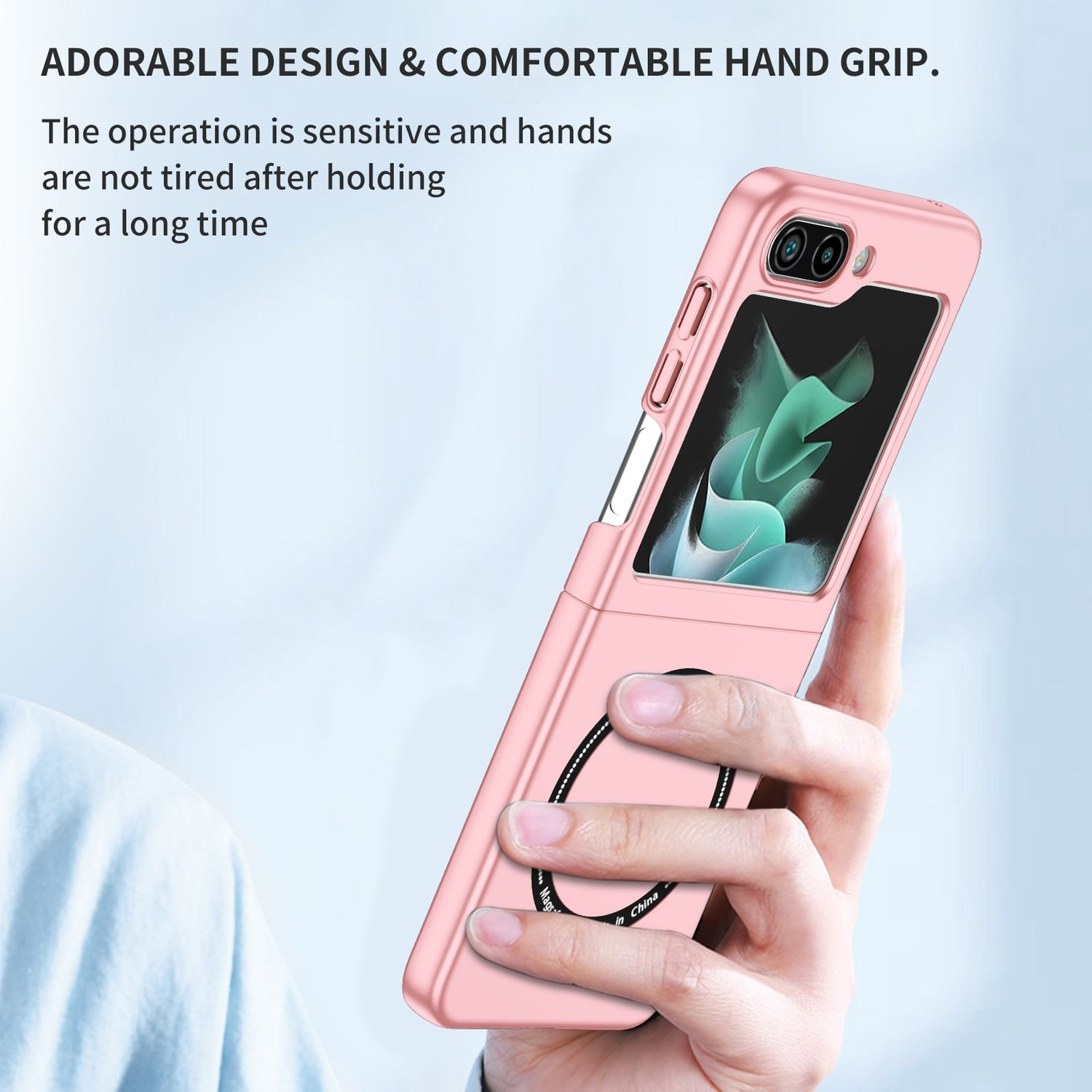 Rosa Handyhülle mit Magnetring und Klappdesign, in der Hand gehalten. Es zeigt ein Bildschirmbild.