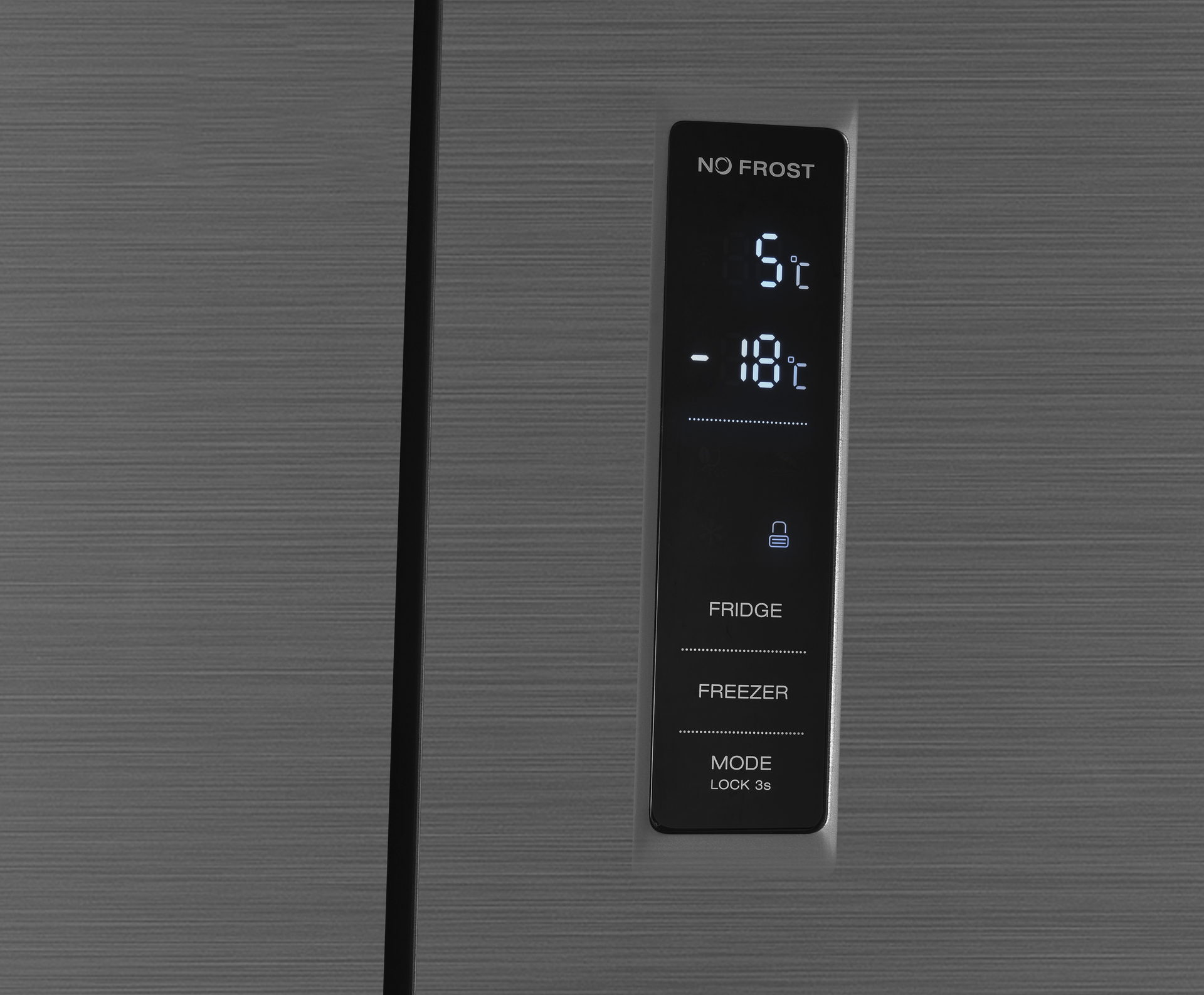 Refrigerator door with a digital display showing the temperature.