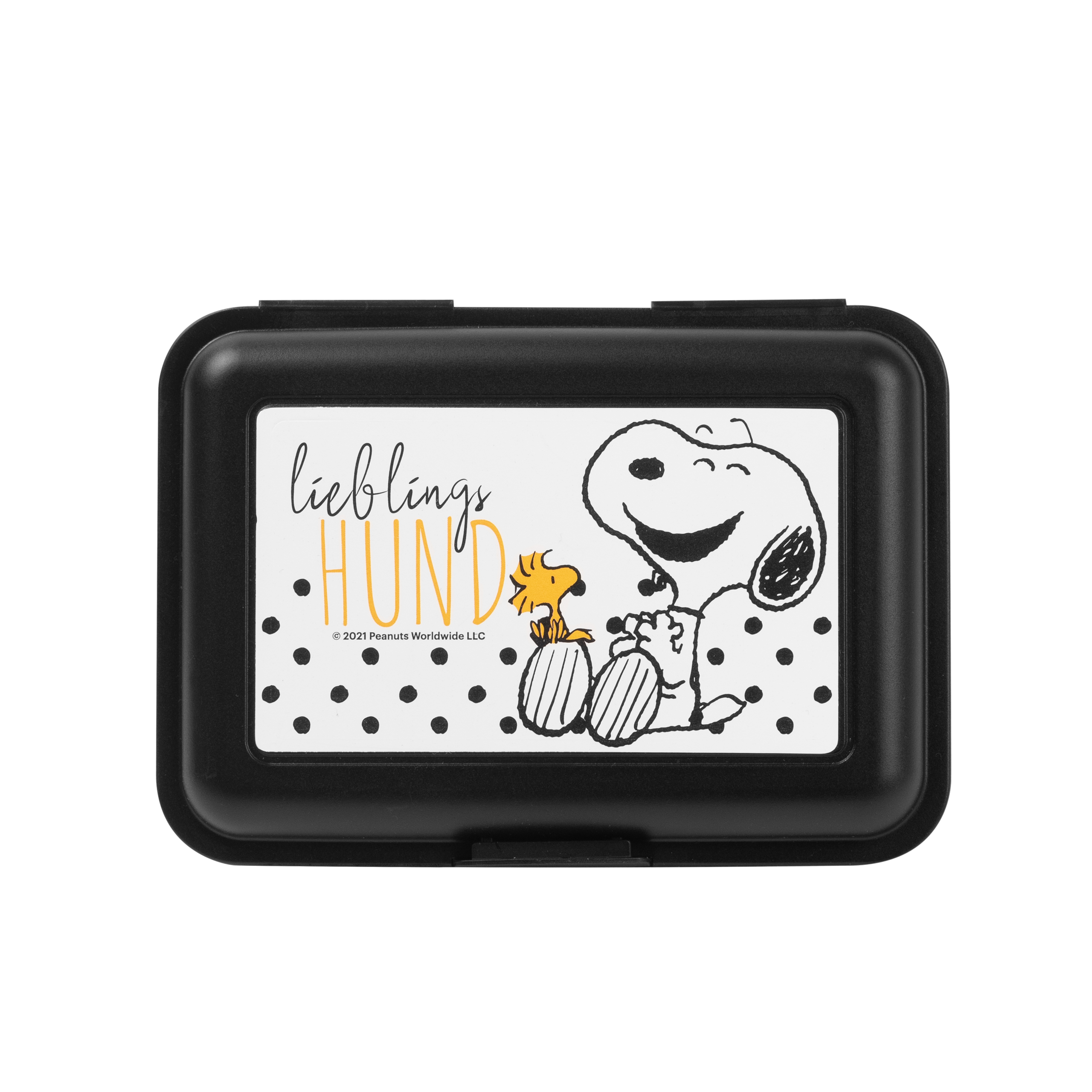 Schwarze Brotdose mit Snoopy und Woodstock. Text sagt 'lieblings hund'. Weißer Hintergrund mit schwarzen Punkten.