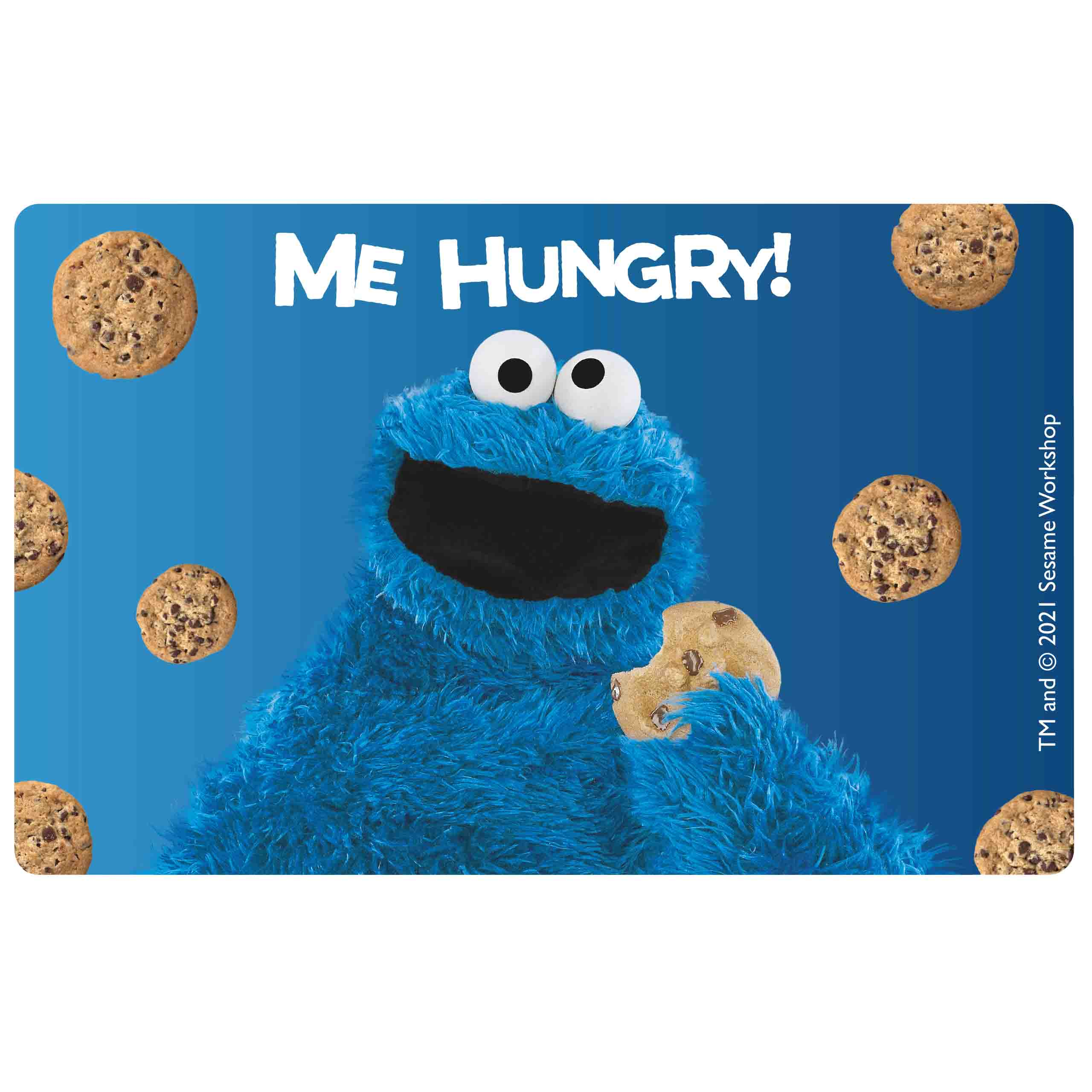 Eine blaue Krümelmonster-Brotdose mit Keksen drumherum und einem Krümelmonster-Bild.