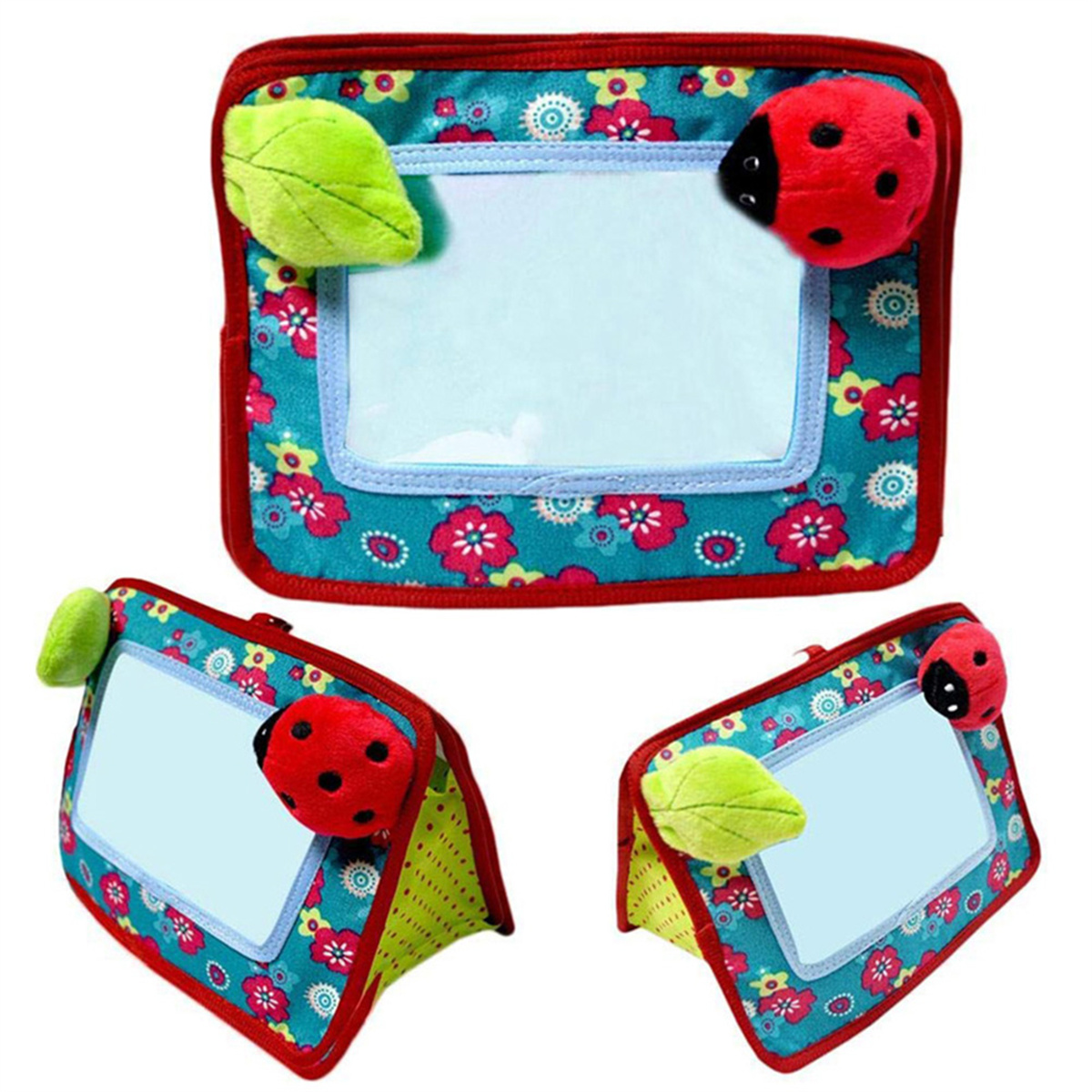 Babyspielzeug mit Spiegel und angebrachten Marienkäfern und Blättern. Das Spielzeug ist mehrfach.