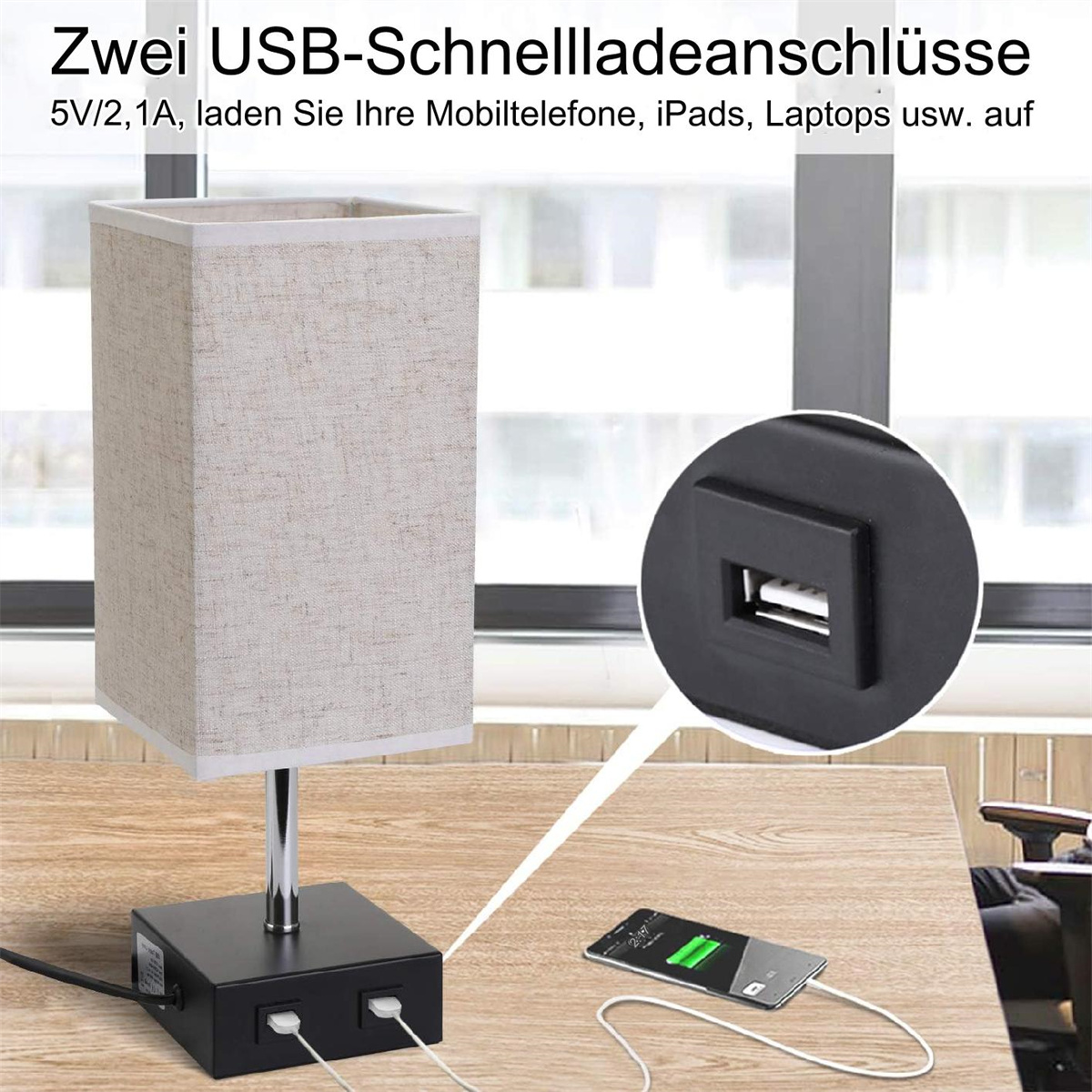 Eine beige Lampe mit schwarzem Sockel, zwei USB-Anschlüssen und einem ladenden Telefon.