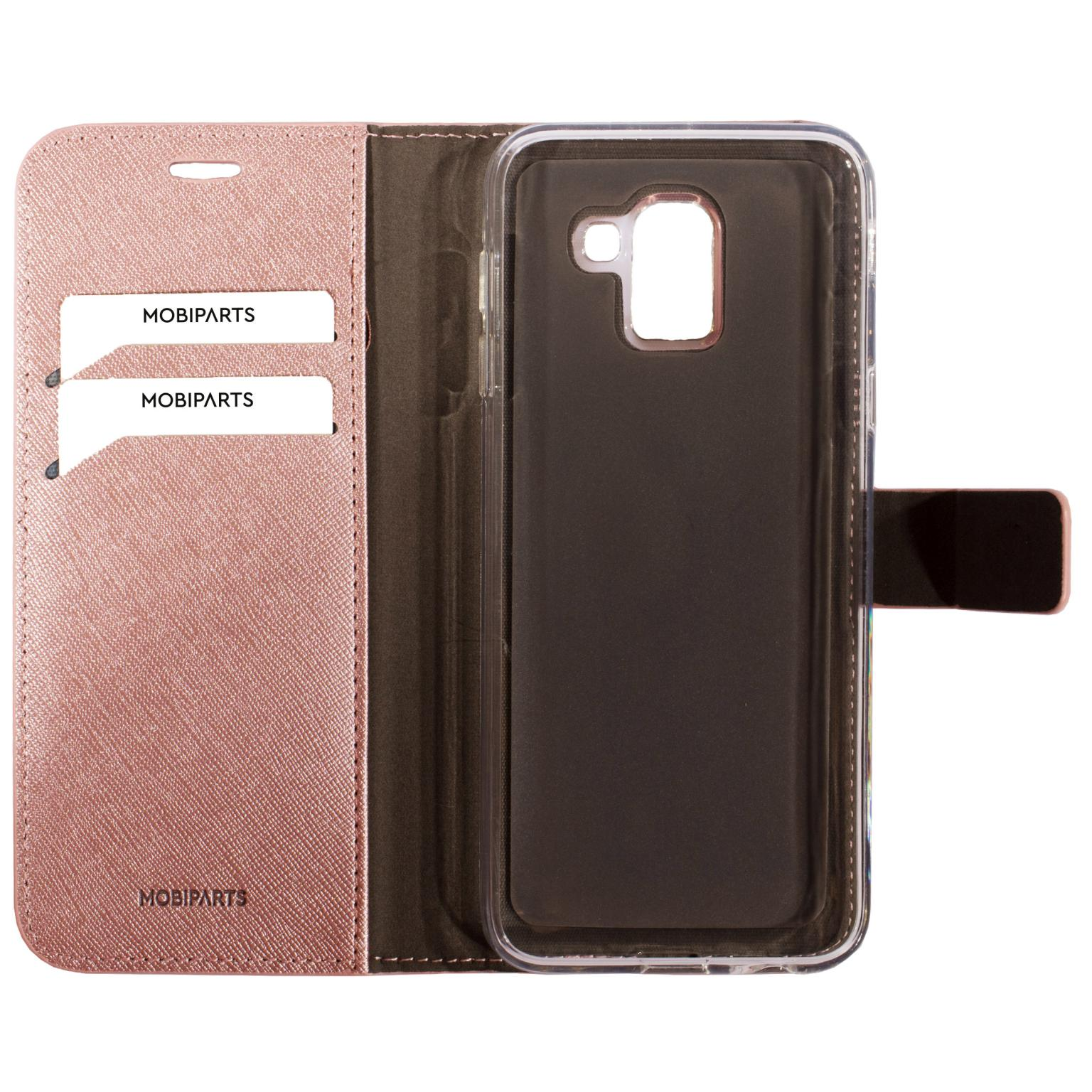 Roze telefoonhoes, open, met kaartsleuven en een doorzichtige telefoonhouder.