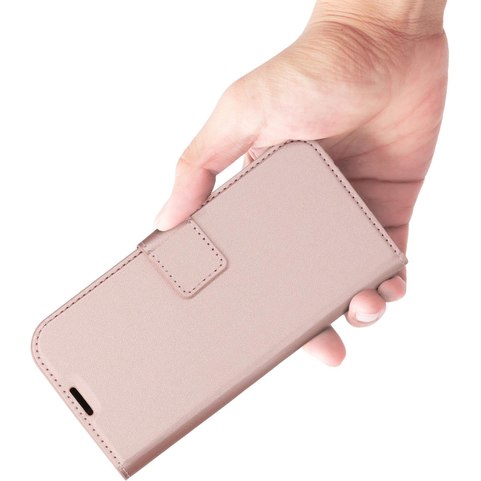 Hand die een roze telefoonhoes vasthoudt. Textuur, magnetische sluiting, verticale weergave.