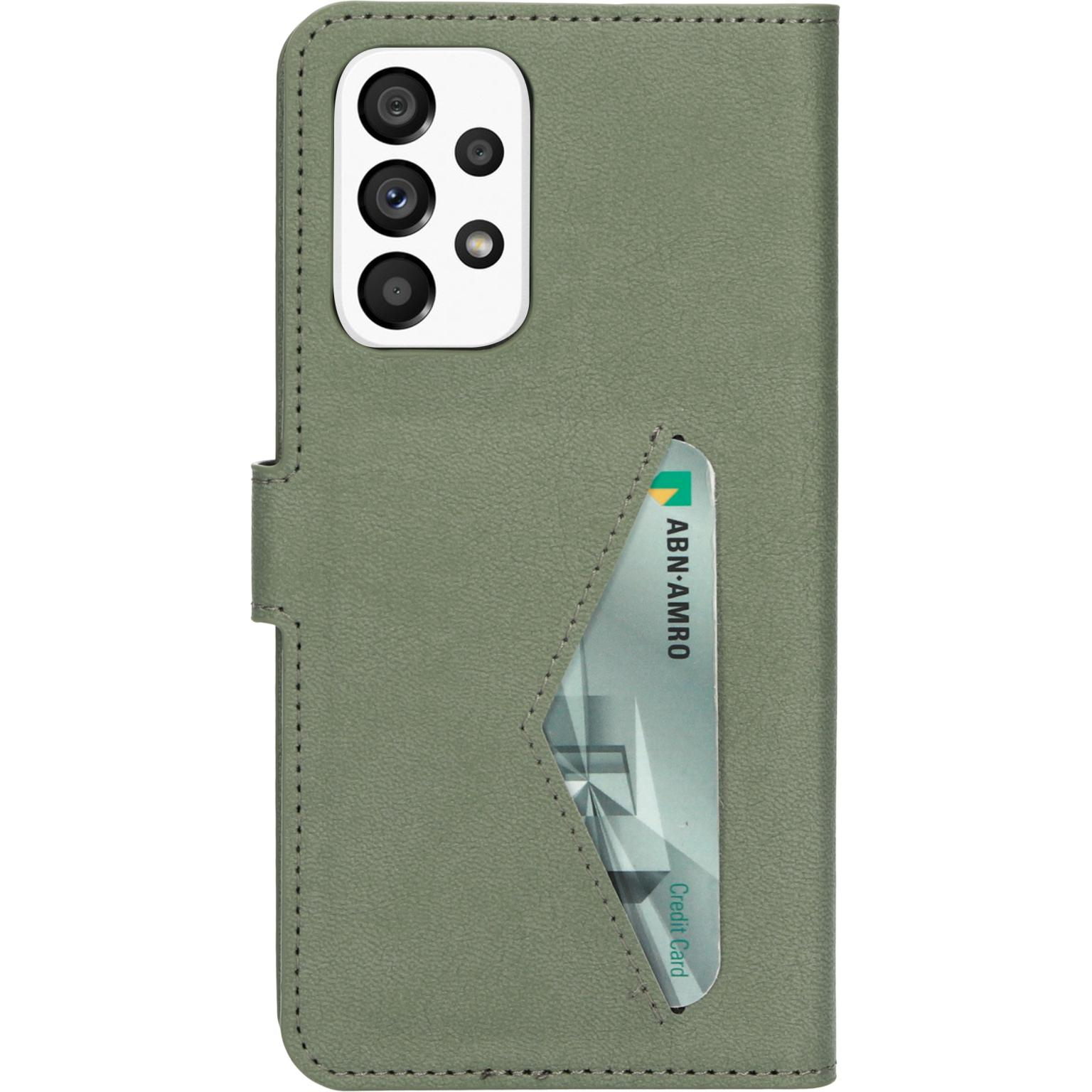 Groene telefoonhoes open, met creditcardsleuf en telefoon. Een ABN-AMRO-kaart zit erin.