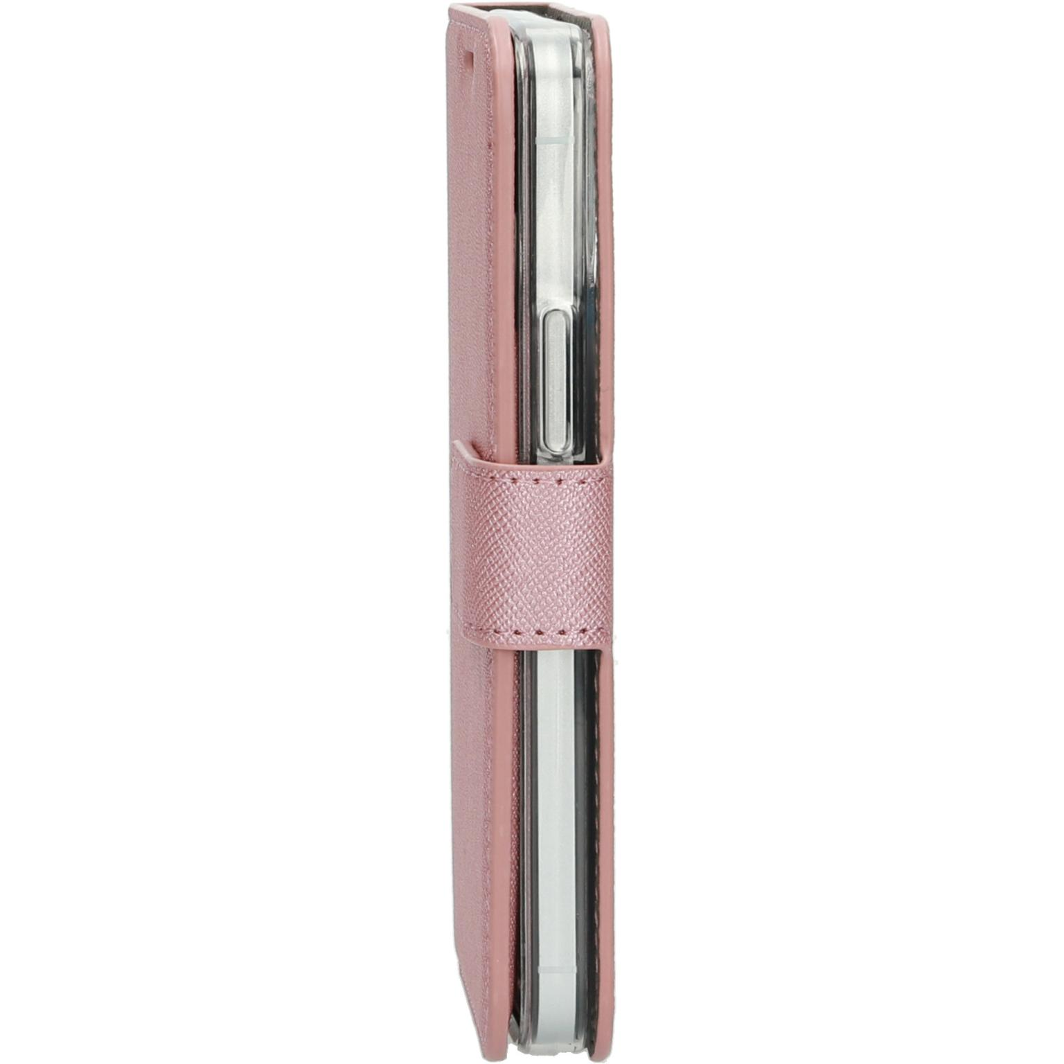 Pink phone case with a flap and magnetic closure.