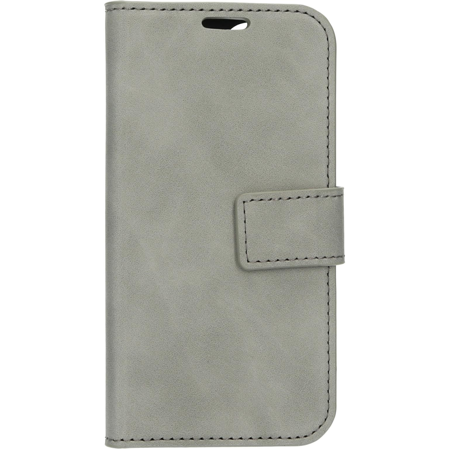 A gray leather phone case with a magnetic closure. The case is closed and has a small hole.