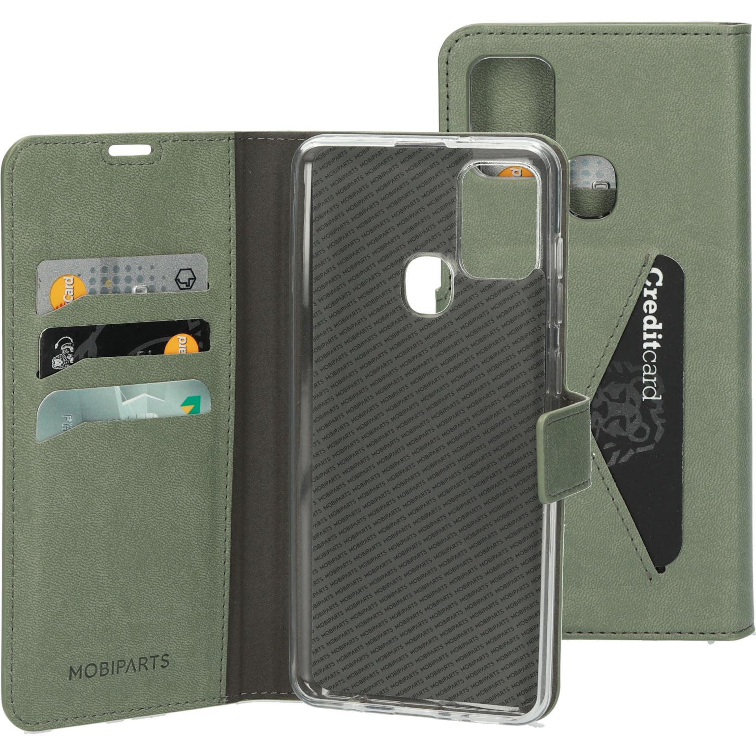 Groene telefoonhoes met telefoon en kaarten. De hoes is open, kaarten zichtbaar.