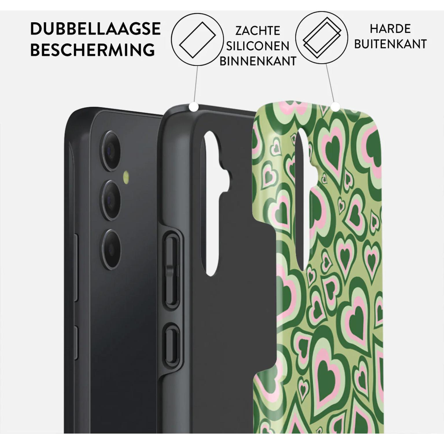 Phone case showing triple-layer protection. The outer layer has a green heart pattern with pink accents.