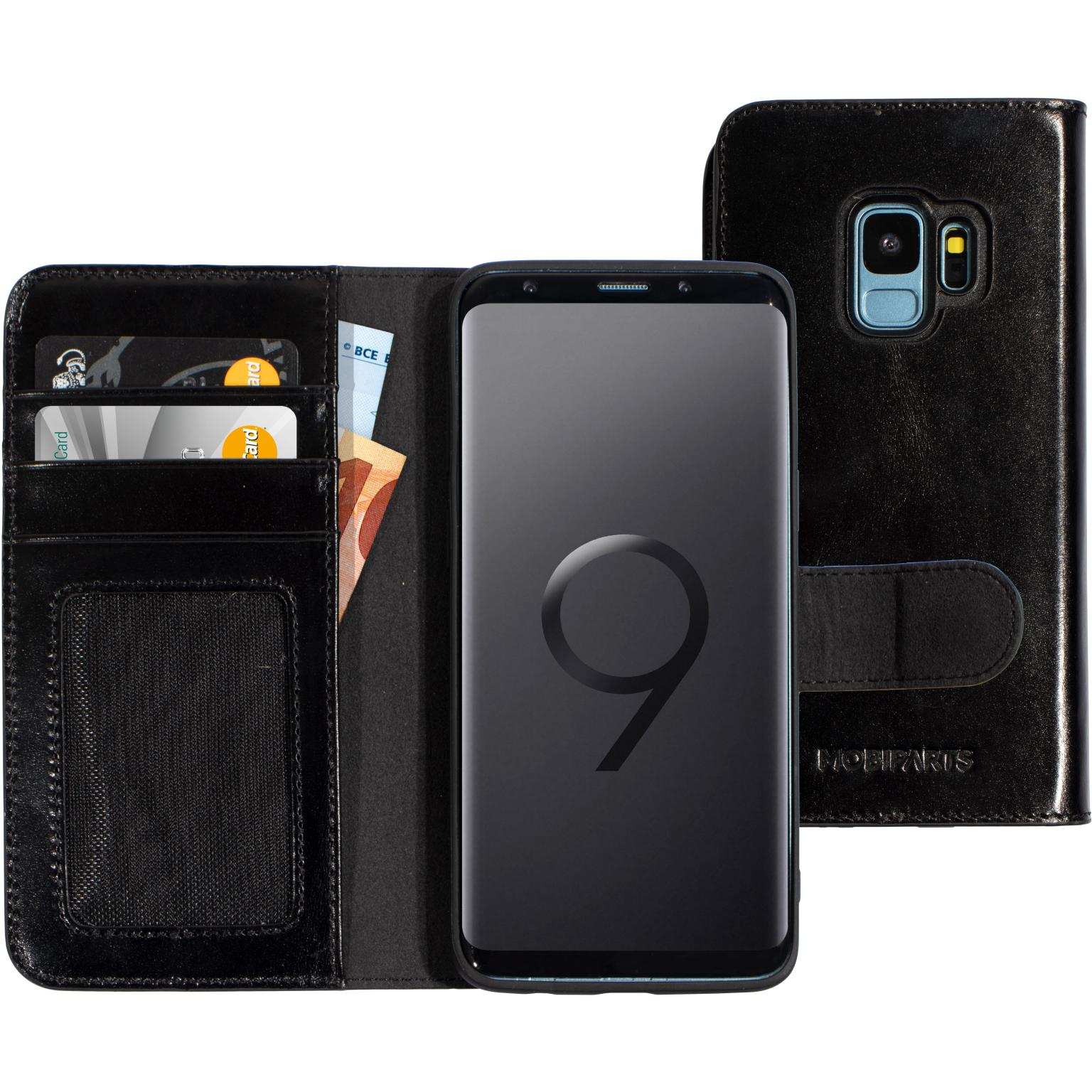 Zwarte leren telefoonhoes open, met telefoon, kaarten en geld. Zwart interieur.