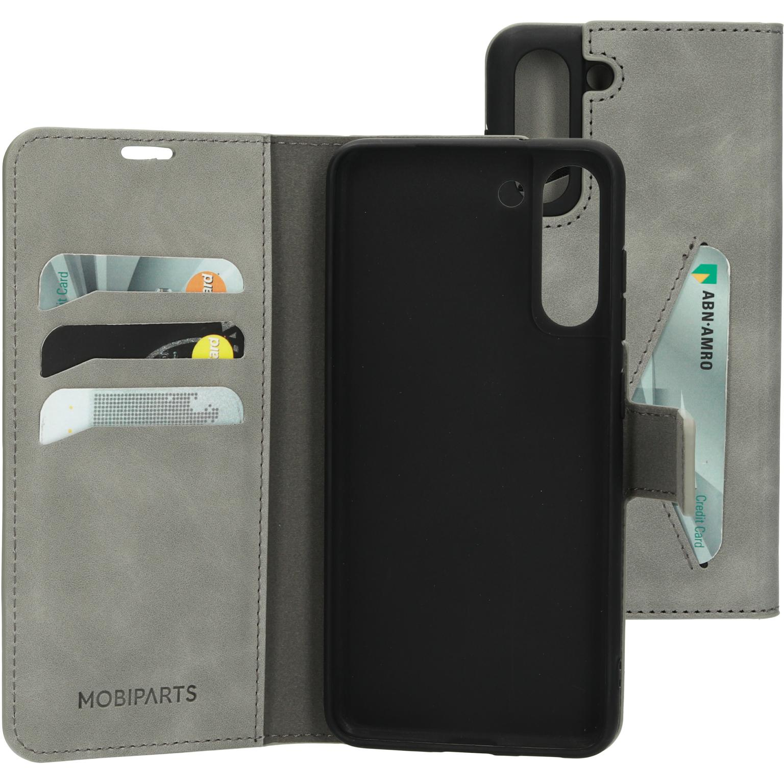 Phone case with credit card slots. Gray leather. Open to show cards. White background.