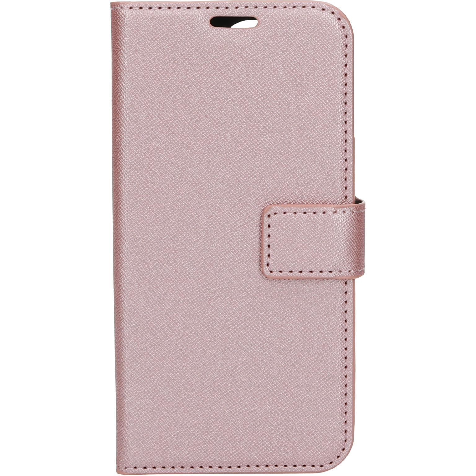 Roze telefoonhoes, gesloten. Het heeft een magnetische sluiting en een glad oppervlak.