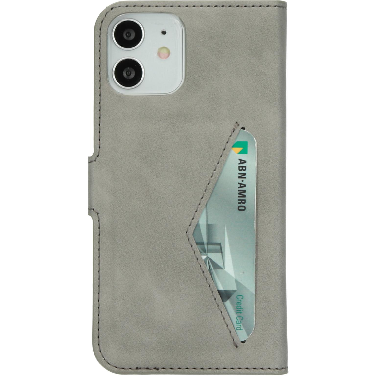 Grey phone case with a credit card visible in the slot.