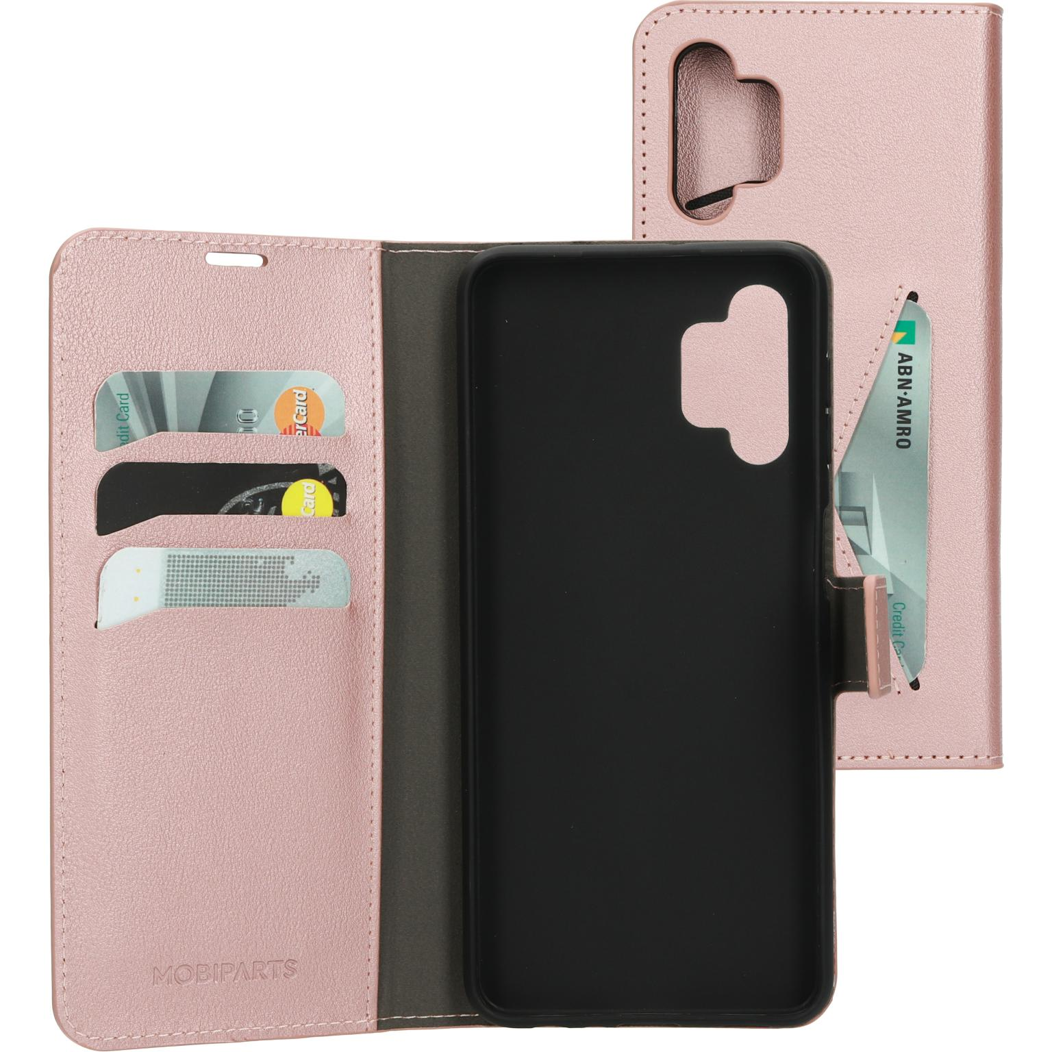Roze telefoonhoesje met kaartsleuven, met kaarten en een zwarte telefoon.