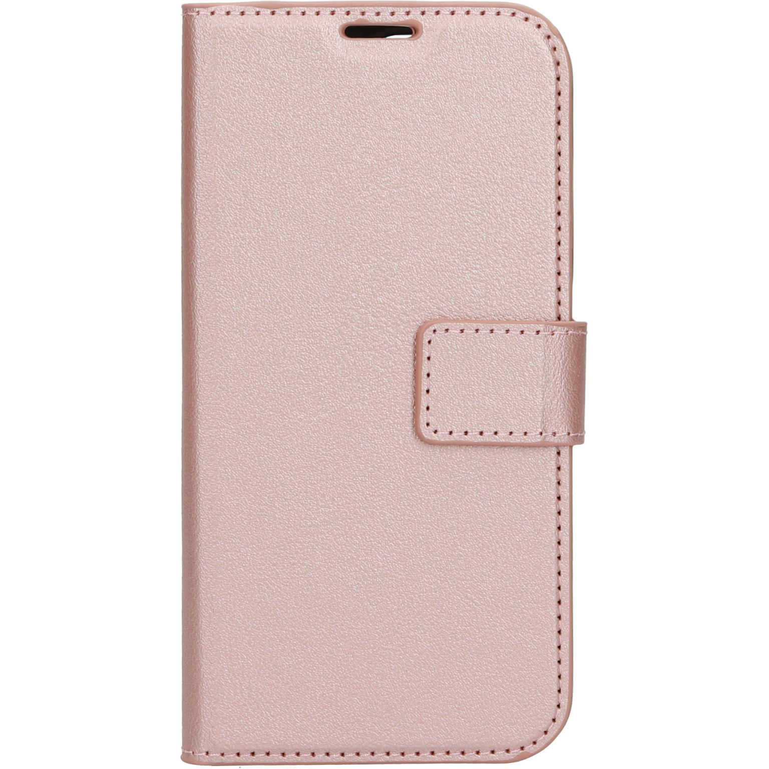 Roze telefoonhoes, gesloten. Heeft een bandsluiting. De stiksels zijn zichtbaar.
