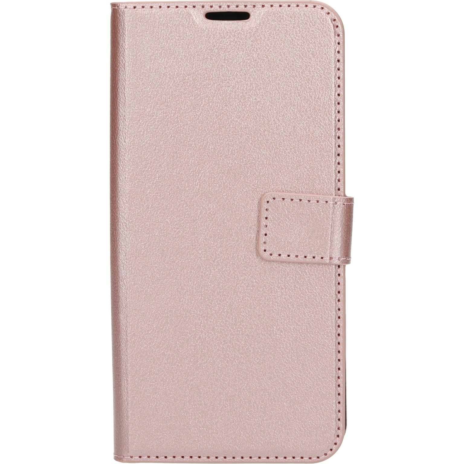 Roze telefoonhoes. Heeft een magnetische sluiting en stiksels op de randen.