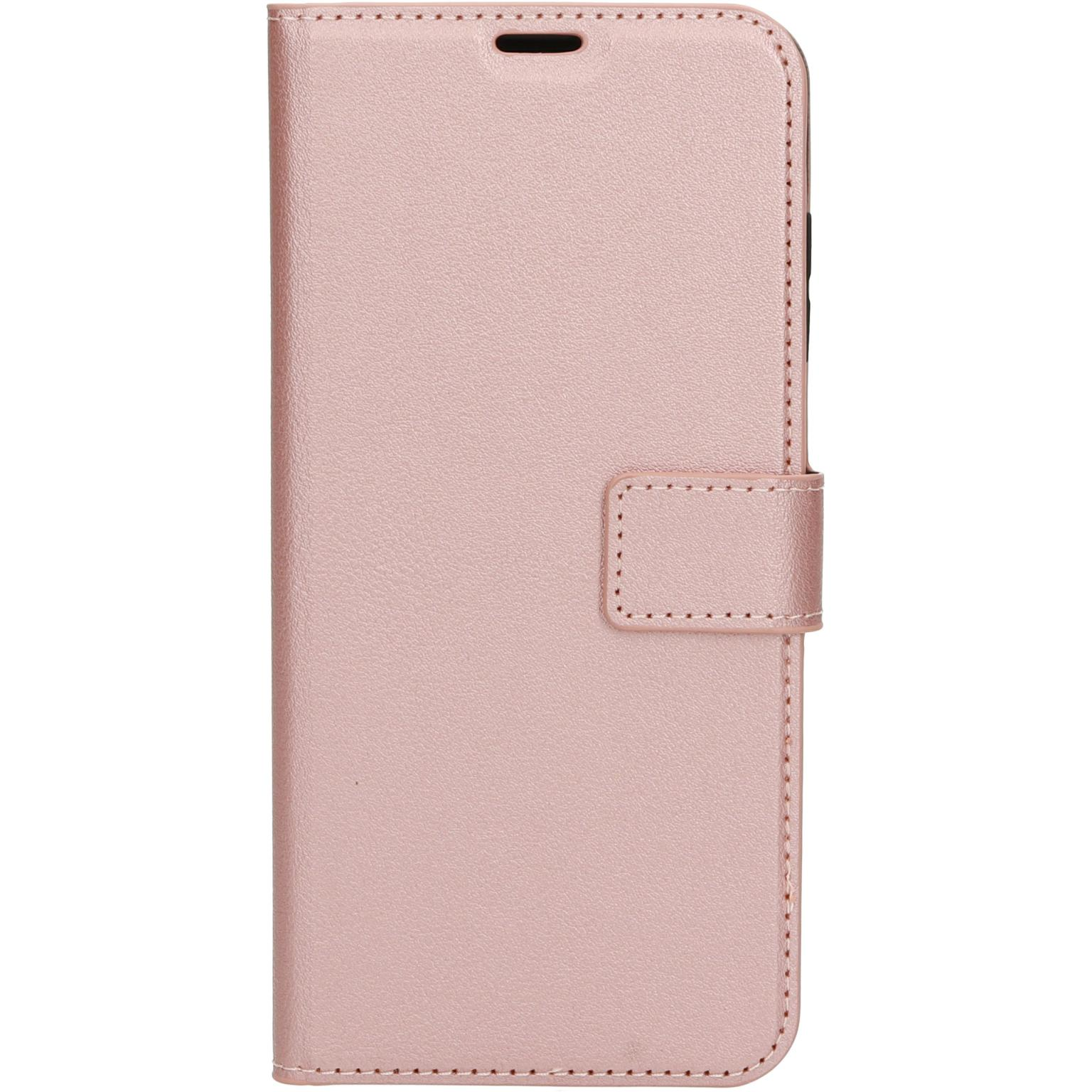 Pink phone case with a flap closure. The case has a textured, leather-like surface.