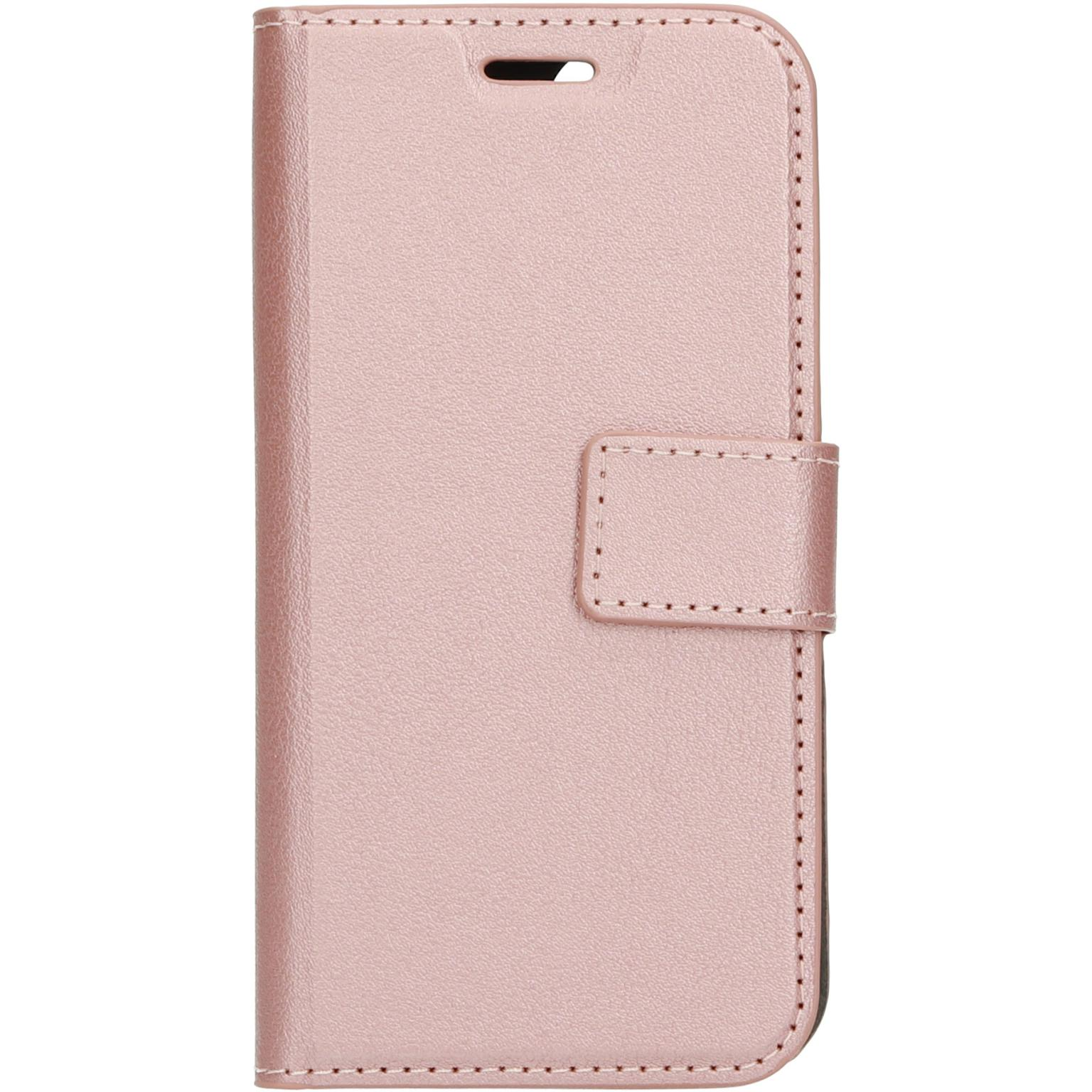 Pink phone case, closed, with a strap and magnetic closure. White background.
