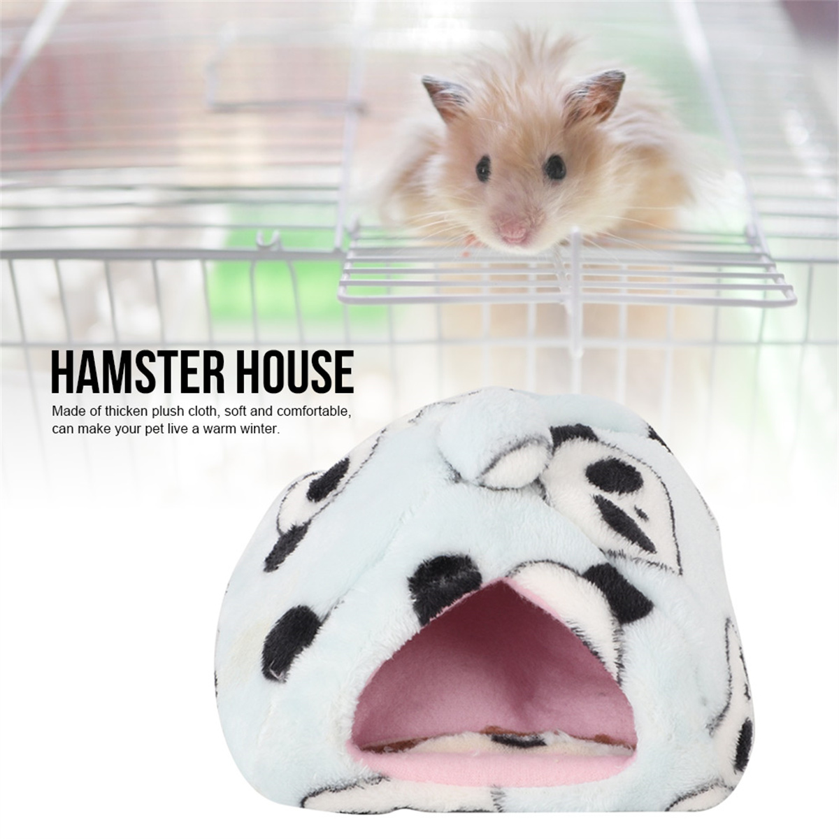 Ein Hamster blickt aus einem Käfig, ein Hamsterhaus davor.