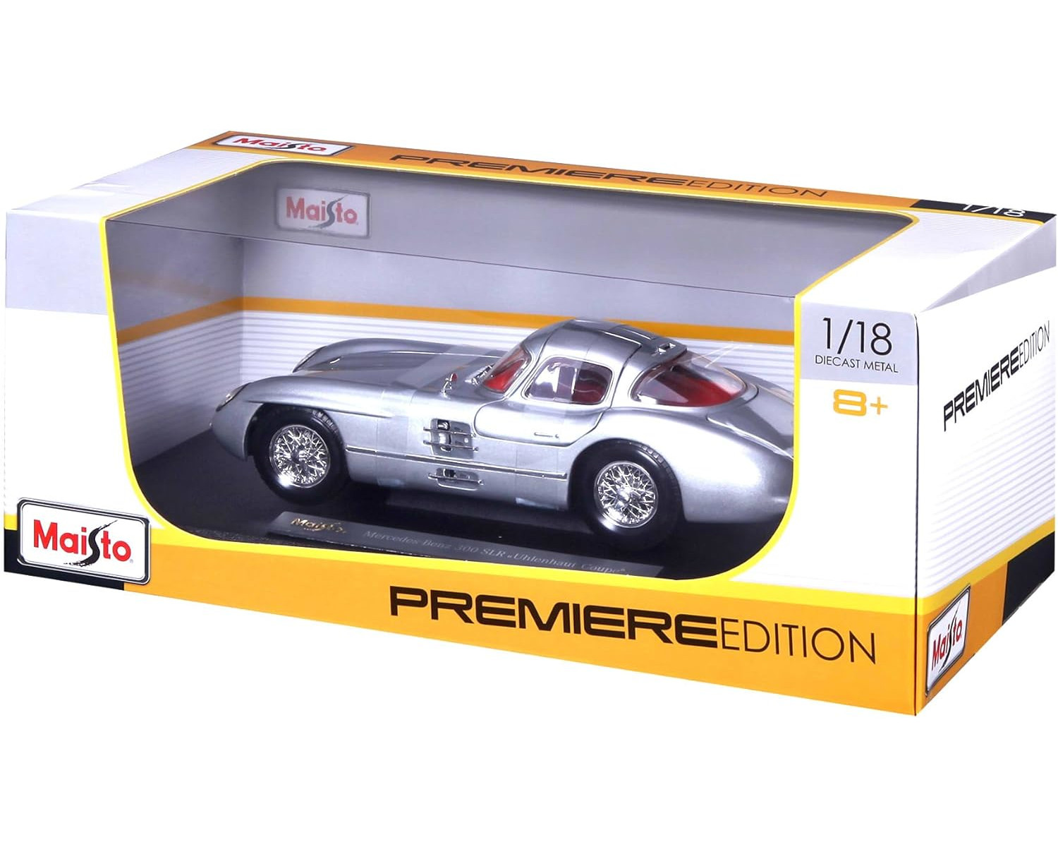 Silbernes Modellauto in einer Schachtel. Das Auto ist ein Mercedes-Benz 300 SLR Uhlenhaut Coupé.