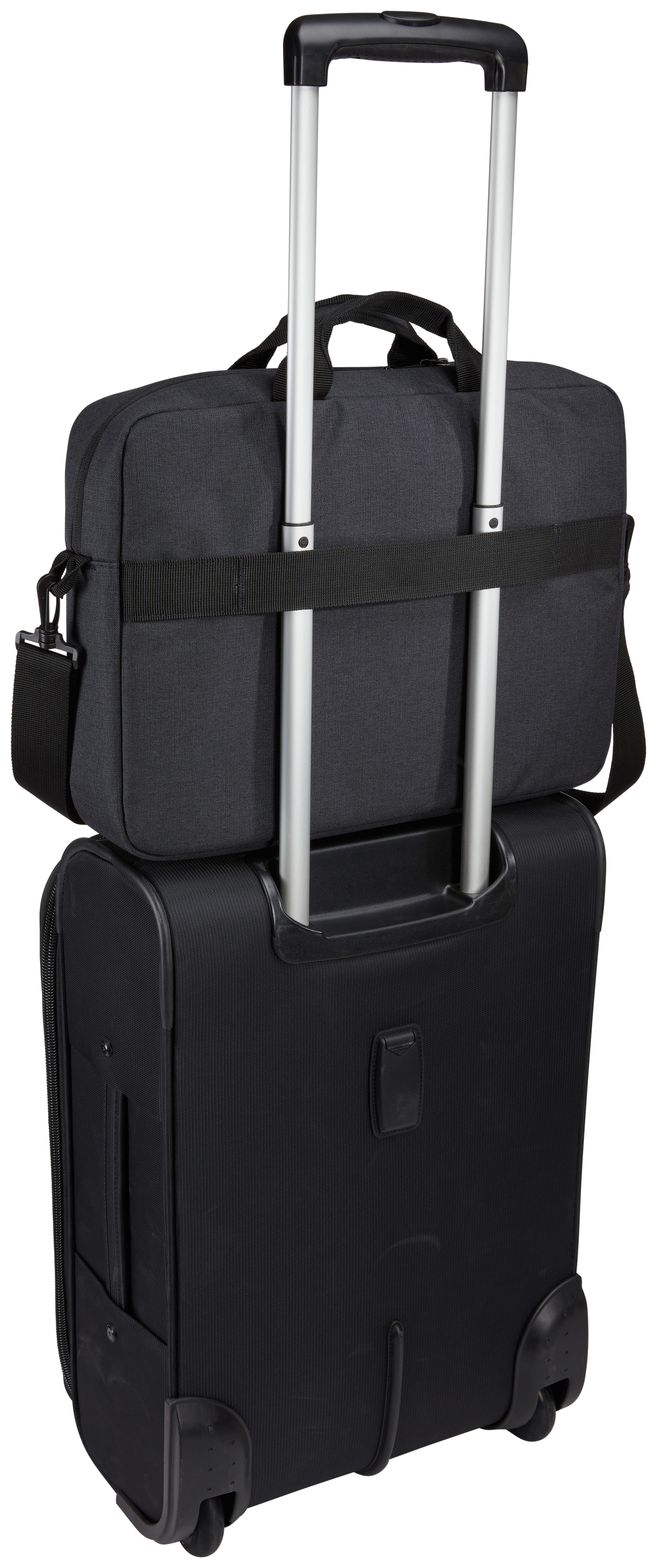 Valigia nera con borsa nera sopra, maniglia su.