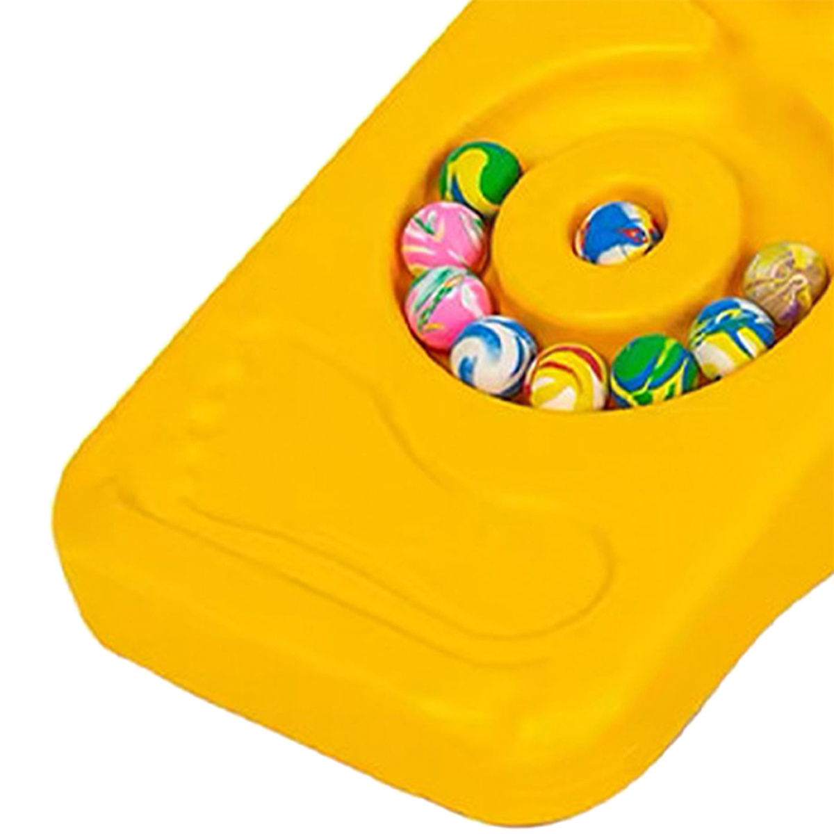 Gelbes Spielzeug mit einem Loch, das bunte Hüpfbälle enthält.