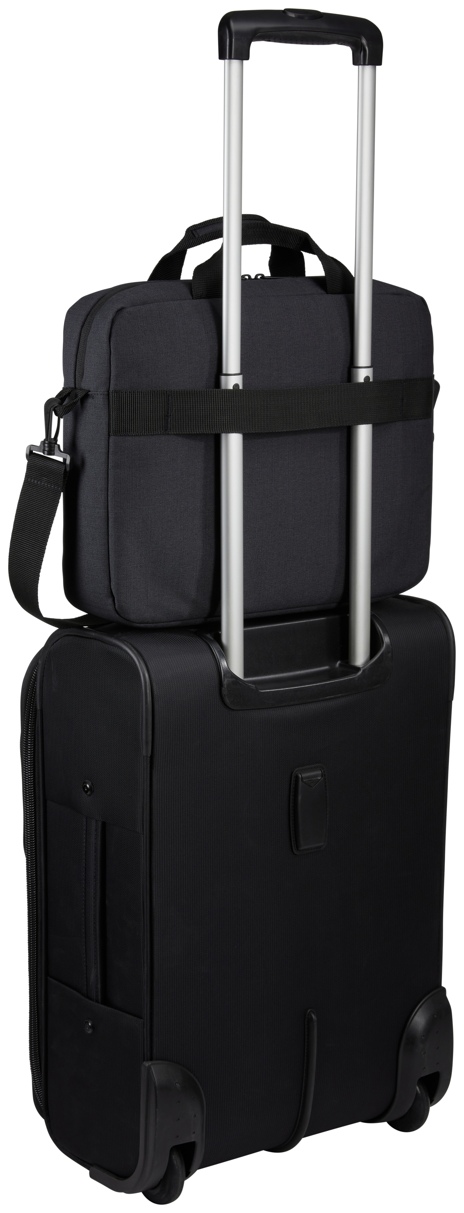 A black suitcase with a black bag on top, secured by a strap. The handle is up.