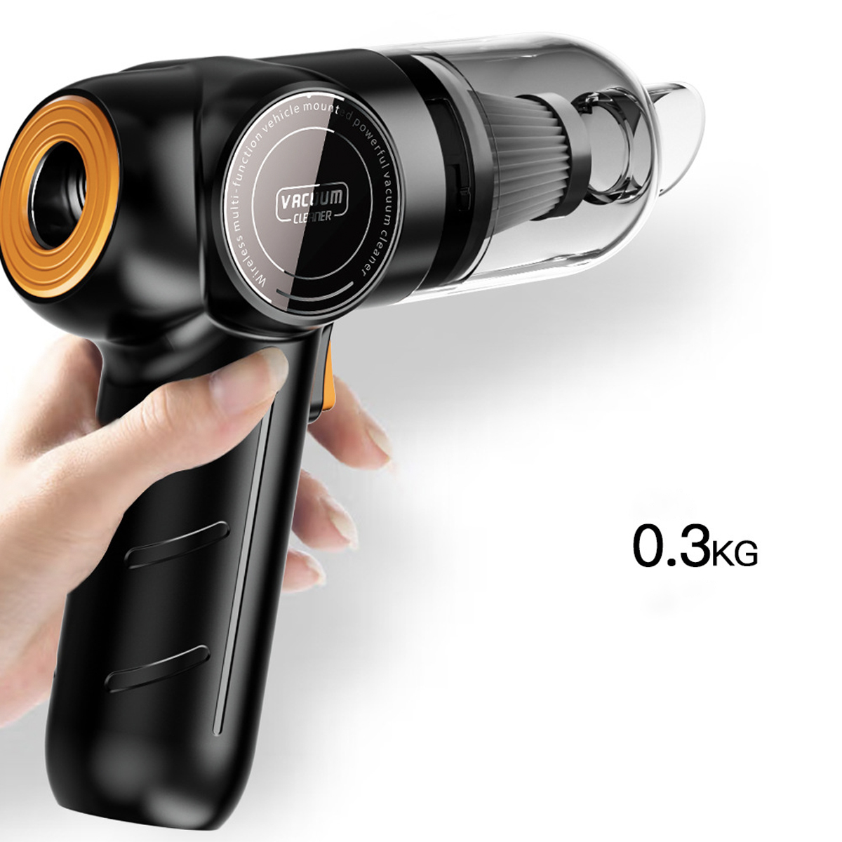 Czarny i przezroczysty odkurzacz bezprzewodowy z pomarańczowym akcentem trzymany w dłoni.