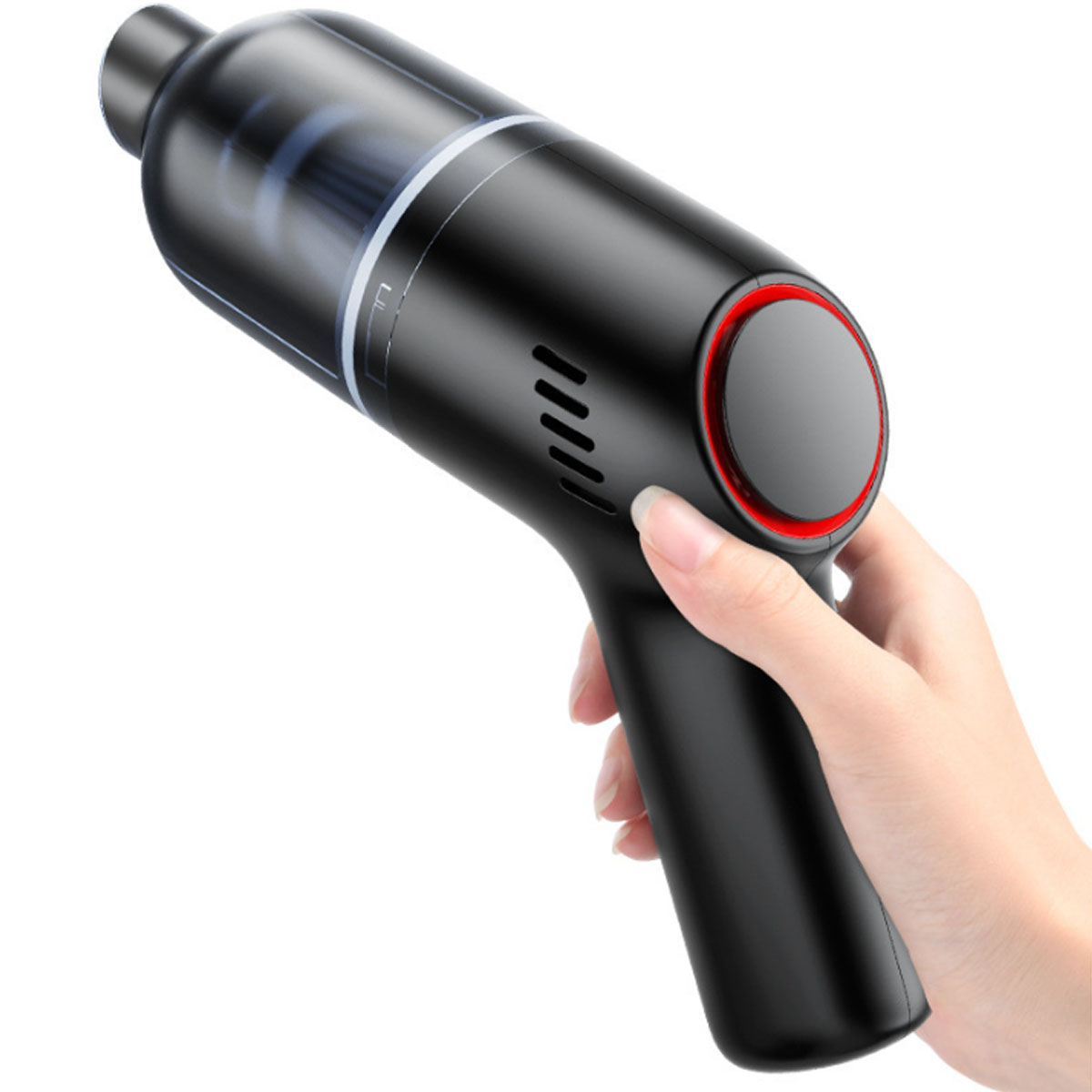 Czarny odkurzacz ręczny. Trzyma go ręka. Ma czerwone koło i przezroczystą część.