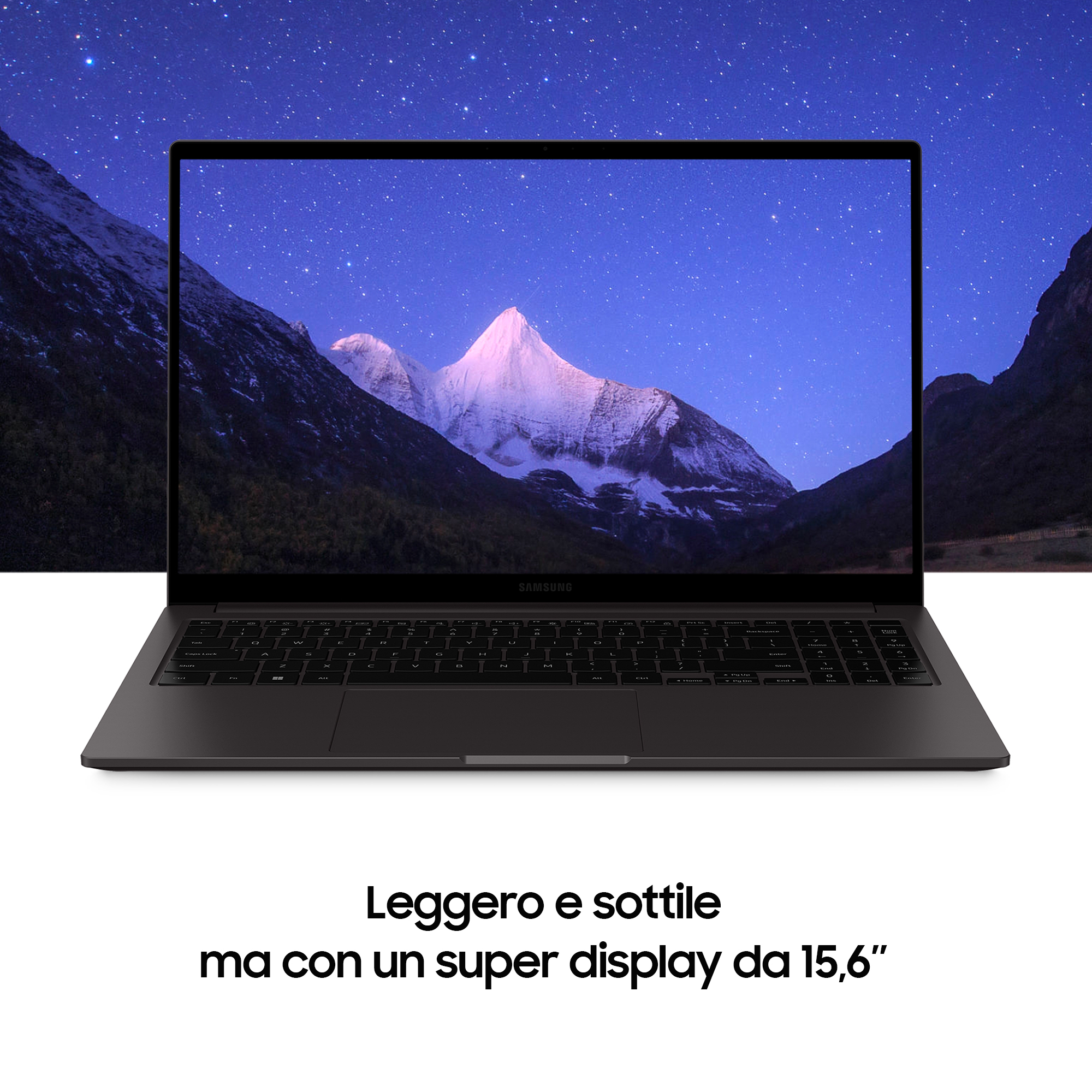 Laptop nero su una superficie, con un paesaggio sullo sfondo. Testo: 'leggero e sottile, con un super display da 15,6'.