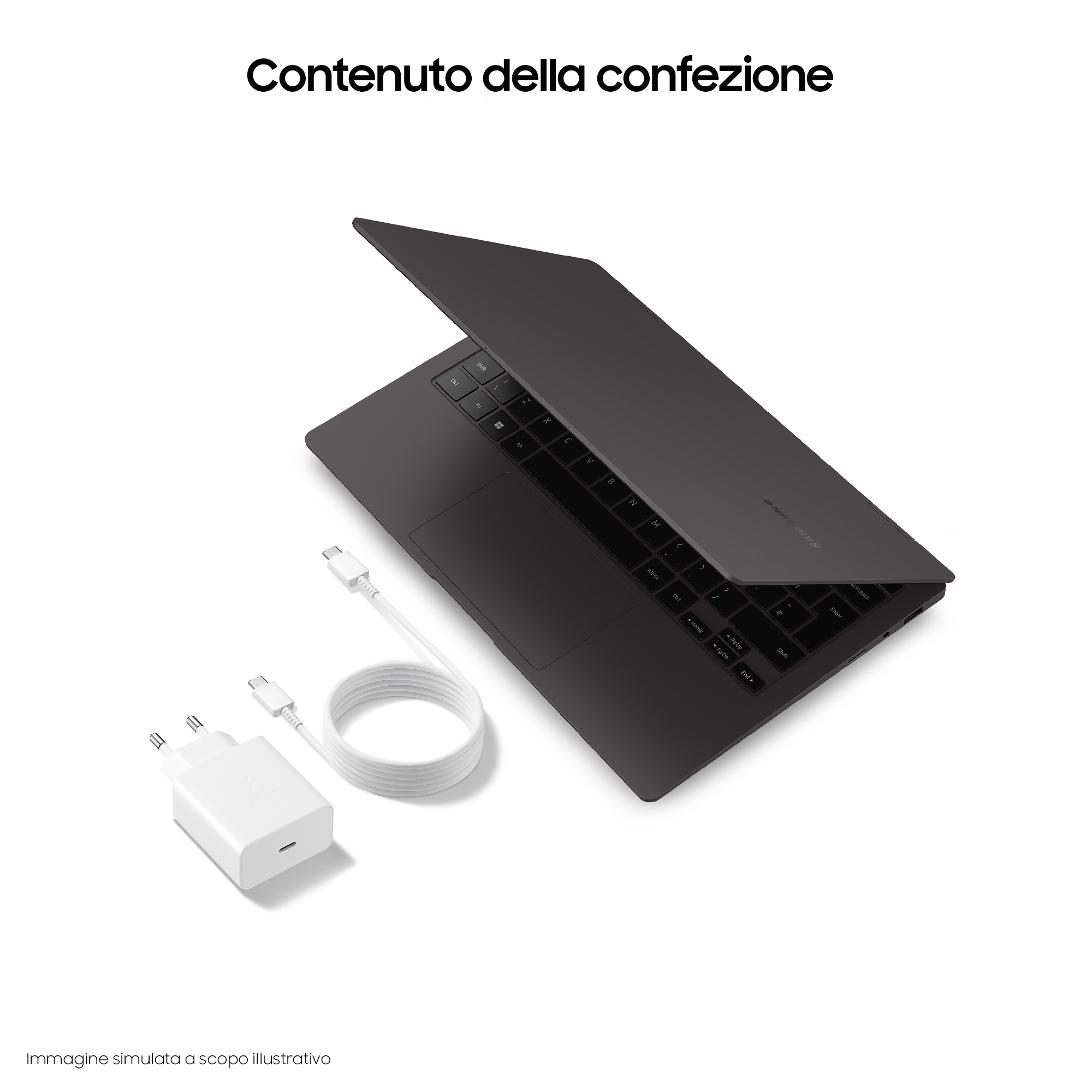 Laptop e caricatore neri su superficie bianca.