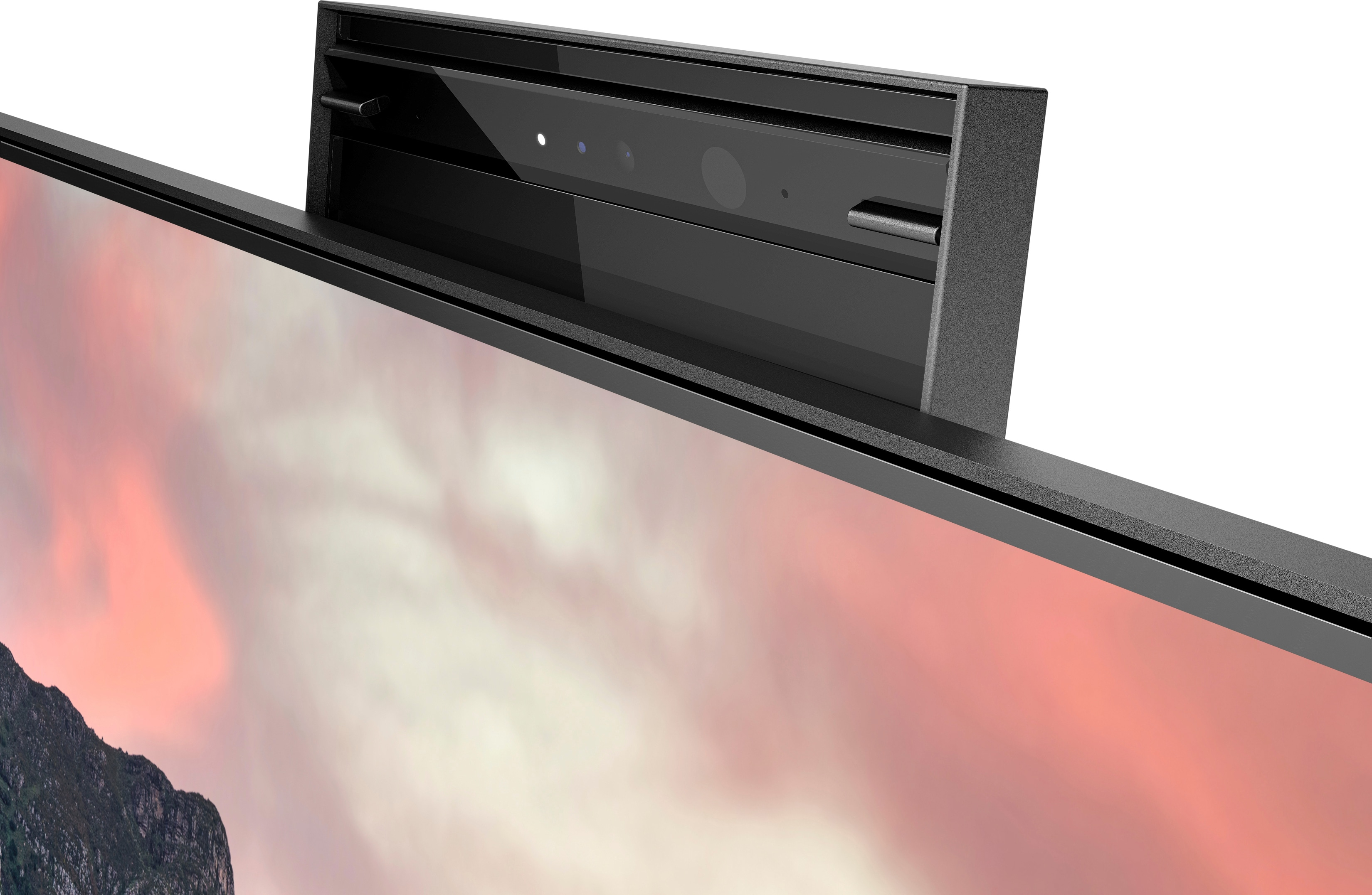 Czarny monitor z kamerą i czujnikami na górze. Ekran wyświetla różowe niebo.