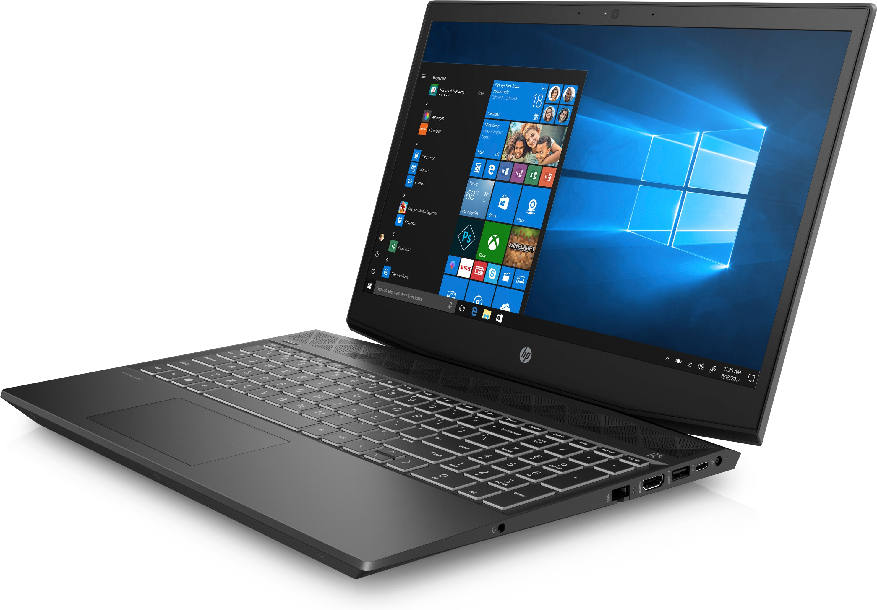 Laptop nero aperto su una superficie bianca, che mostra uno schermo Windows colorato.