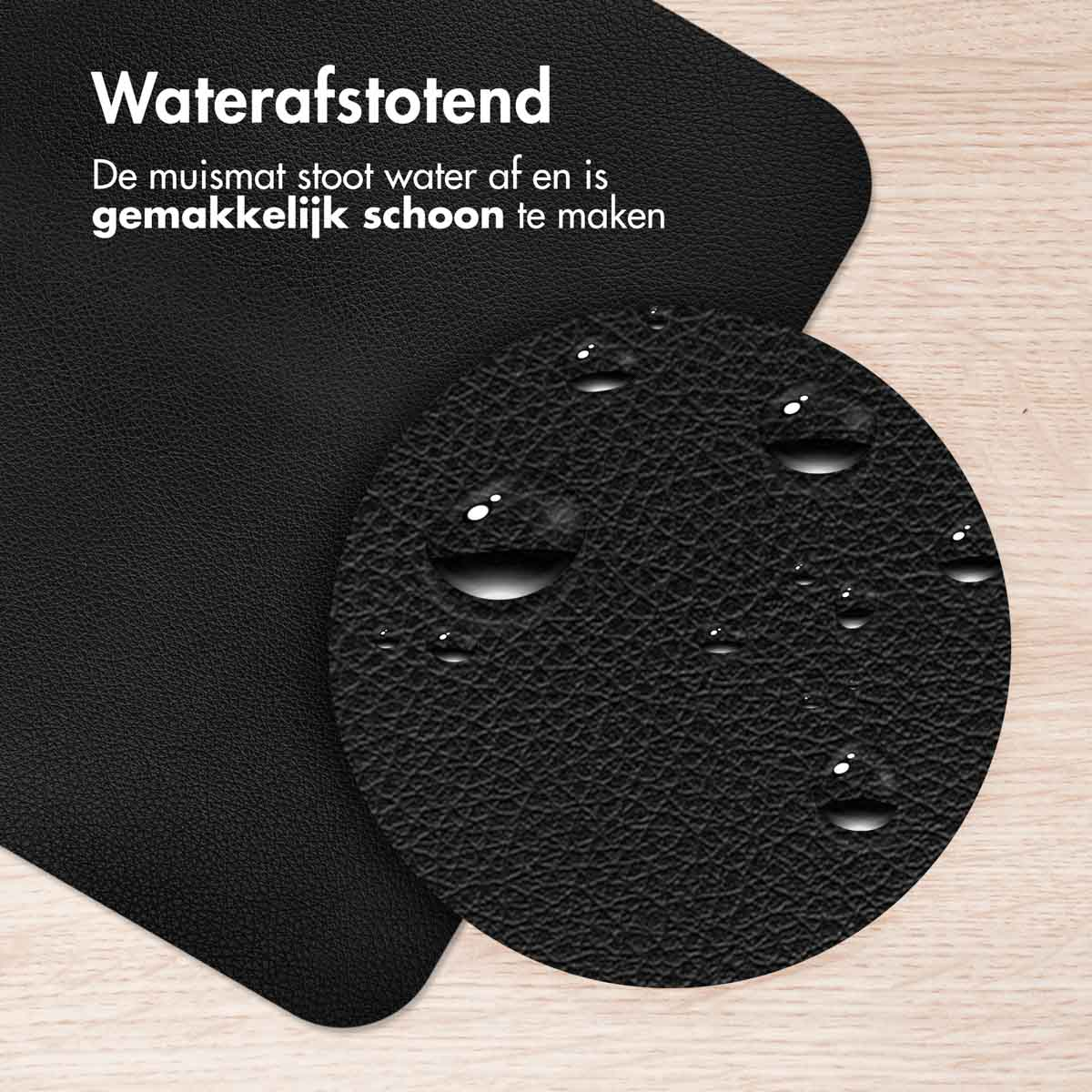 Black mousepad with water droplets on a circular part. Text says waterproof and easy to clean.