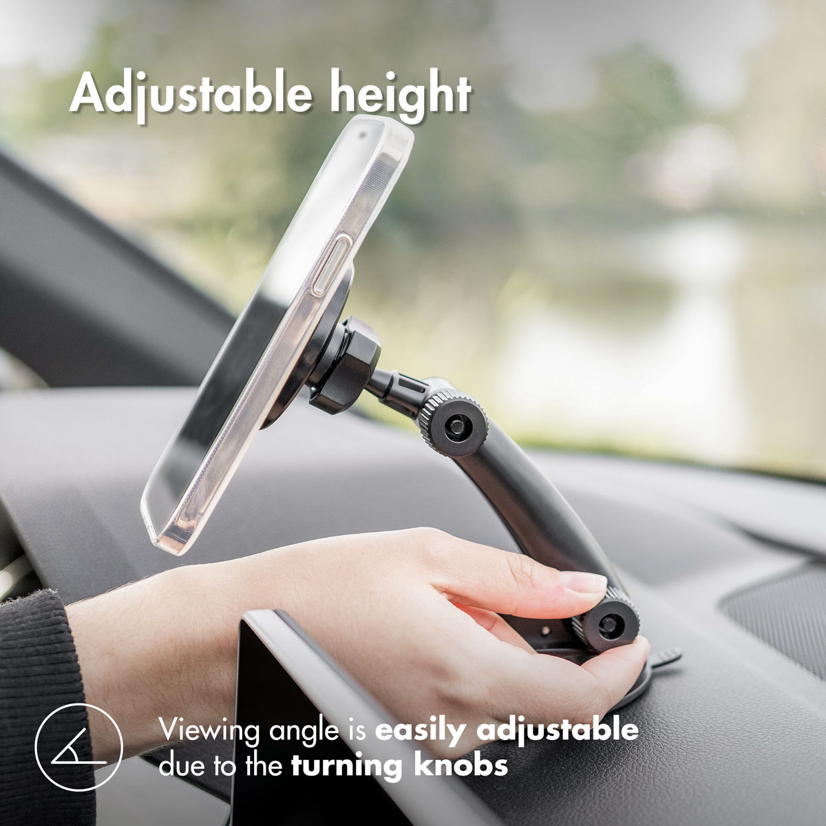 Black car phone holder with a phone attached. The height is adjustable with turning knobs. Dashboard visible.
